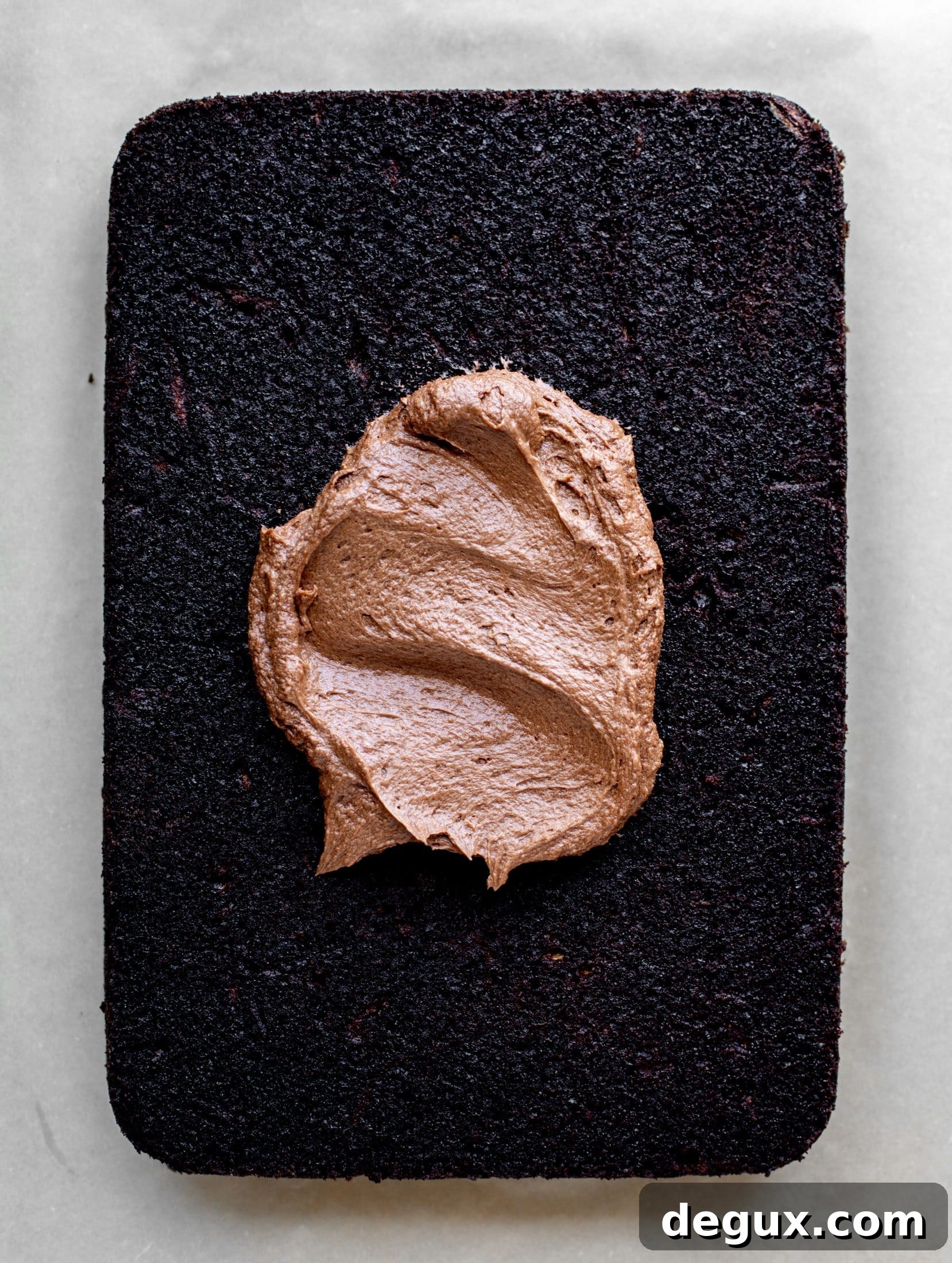 frosting on chocolate zucchini sheet cake