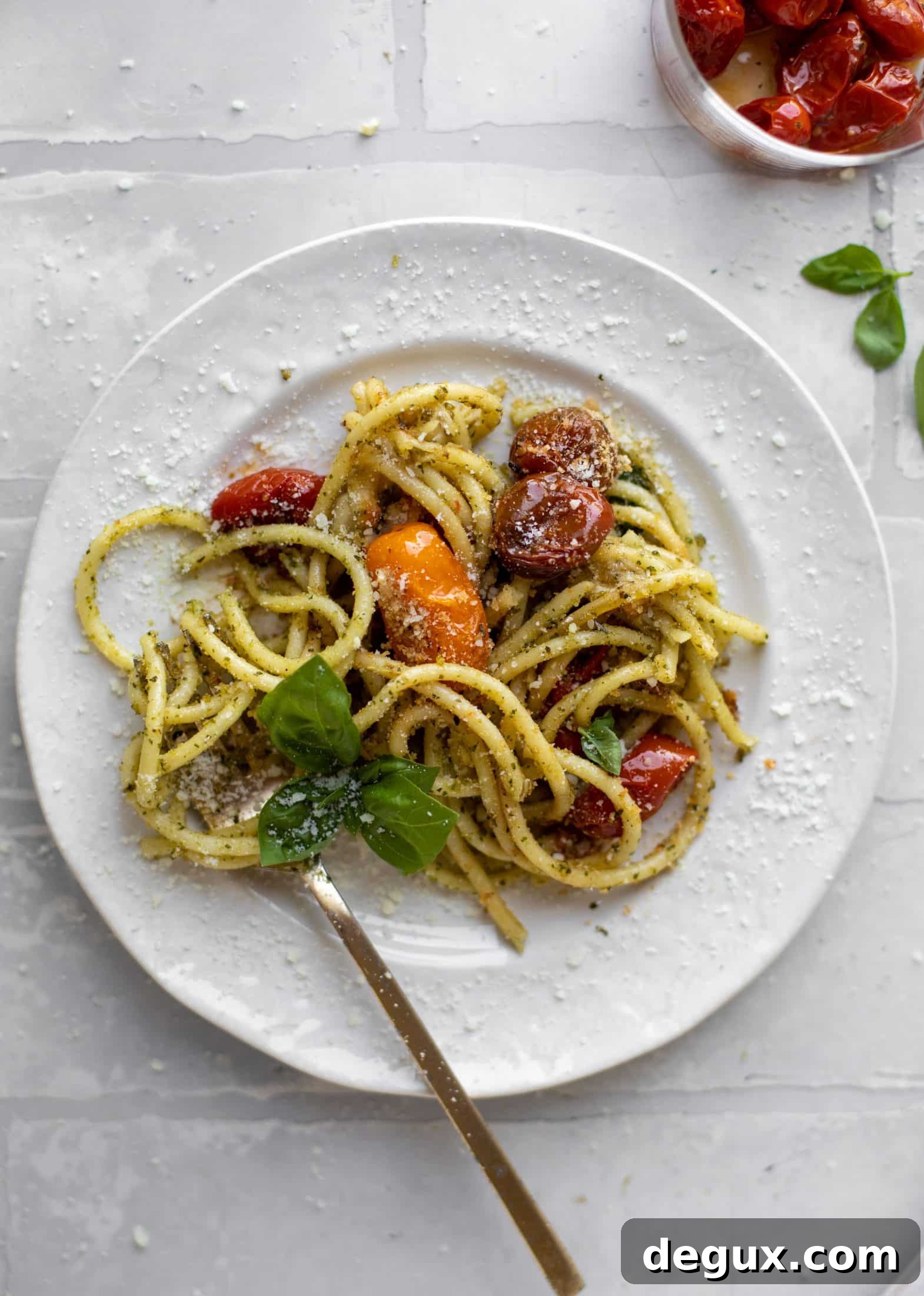 fork twirling baked pesto pasta