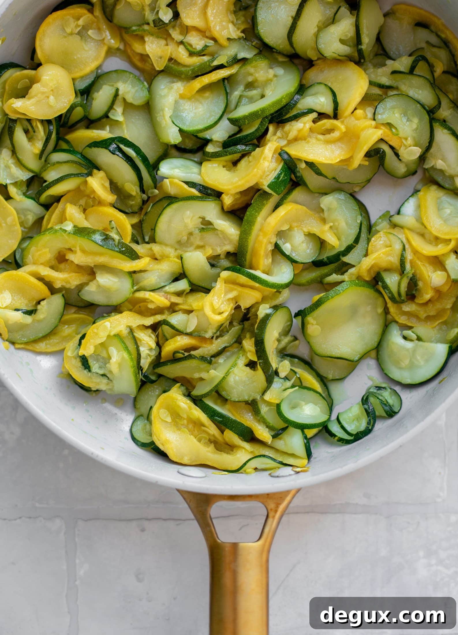 summer squash and zucchini in a skillet