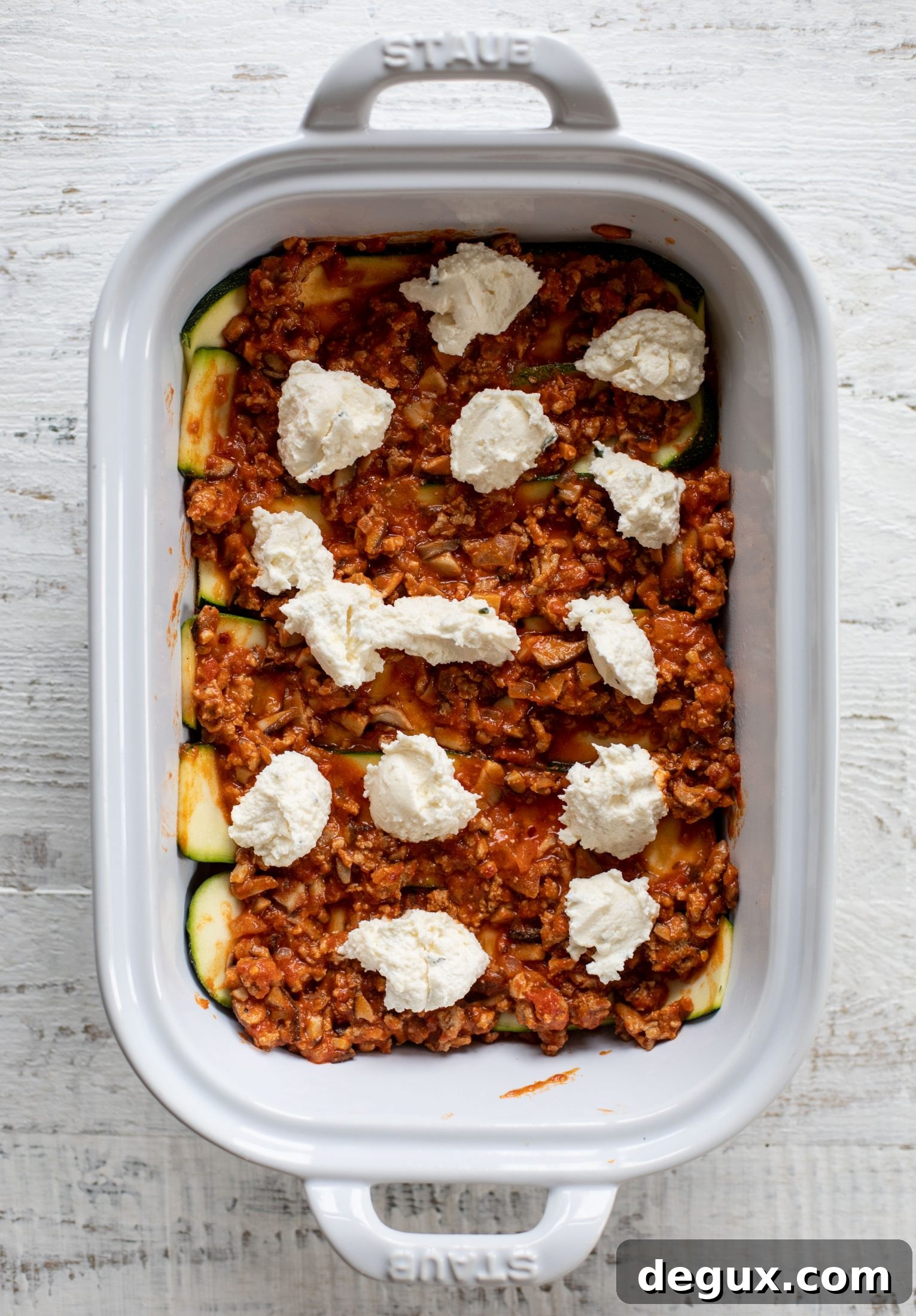 Zucchini Lasagna Bolognese with Spicy Basil Breadcrumb Topping 6 layering the zucchini lasagna bolognese
