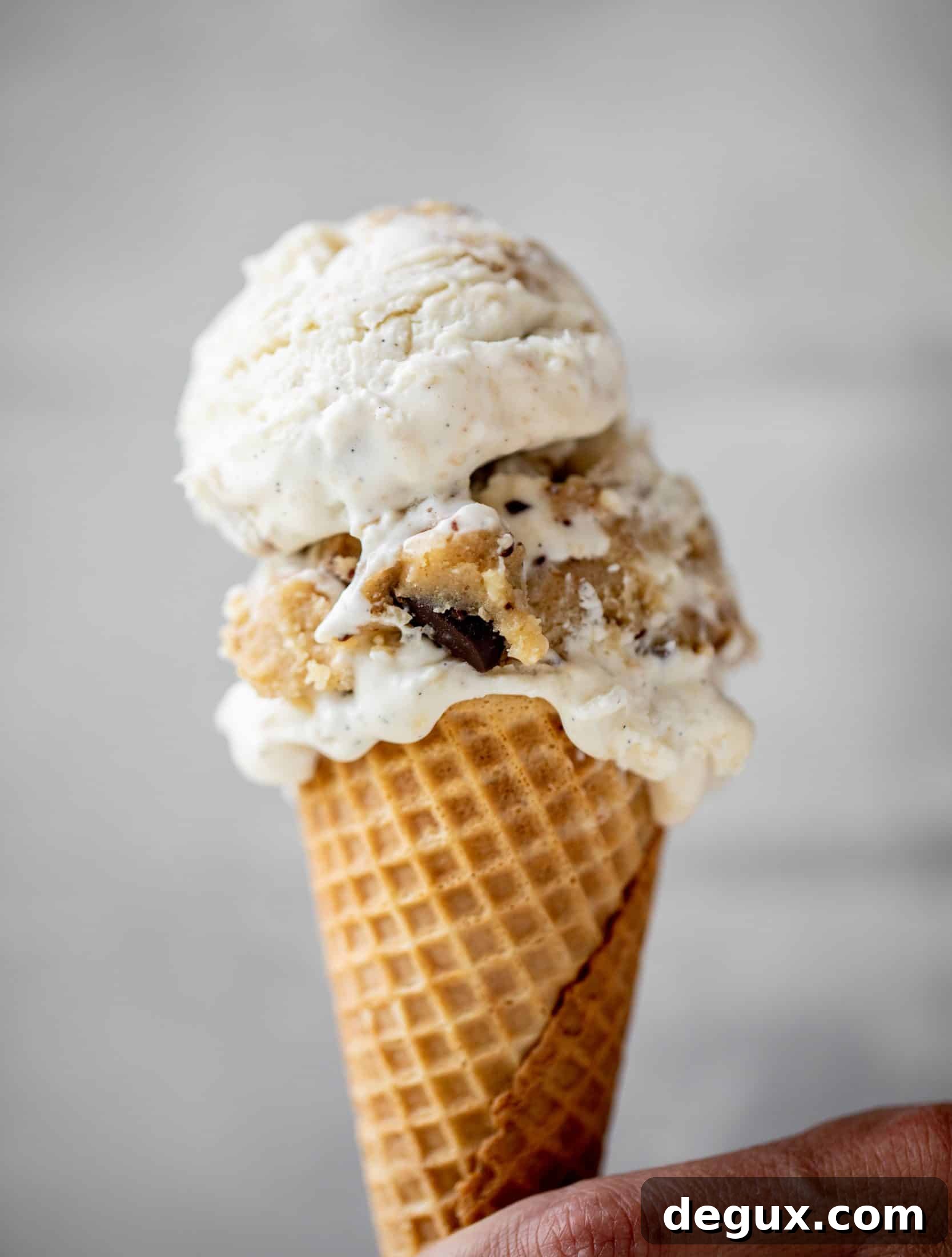 Salted Chocolate Chip Cookie Dough No-Churn Ice Cream 11 scoop of no churn salted chocolate chip cookie dough ice cream in a cone
