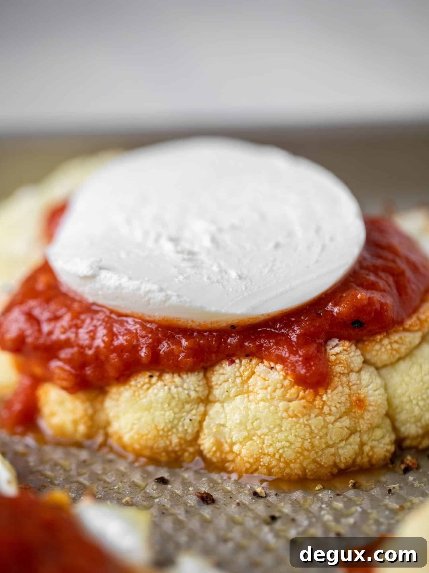 fresh mozzarella, sauce on cauliflower