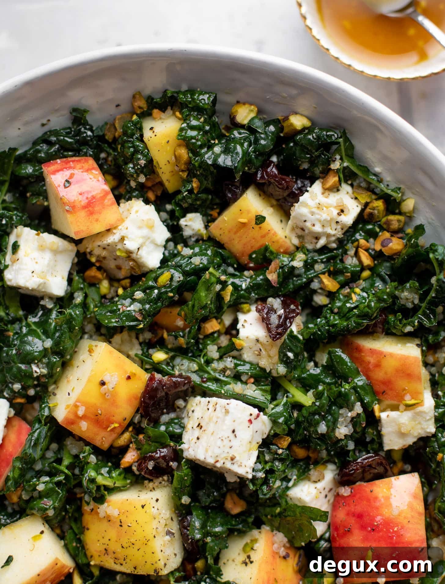 honeycrisp quinoa salad with kale and pistachios