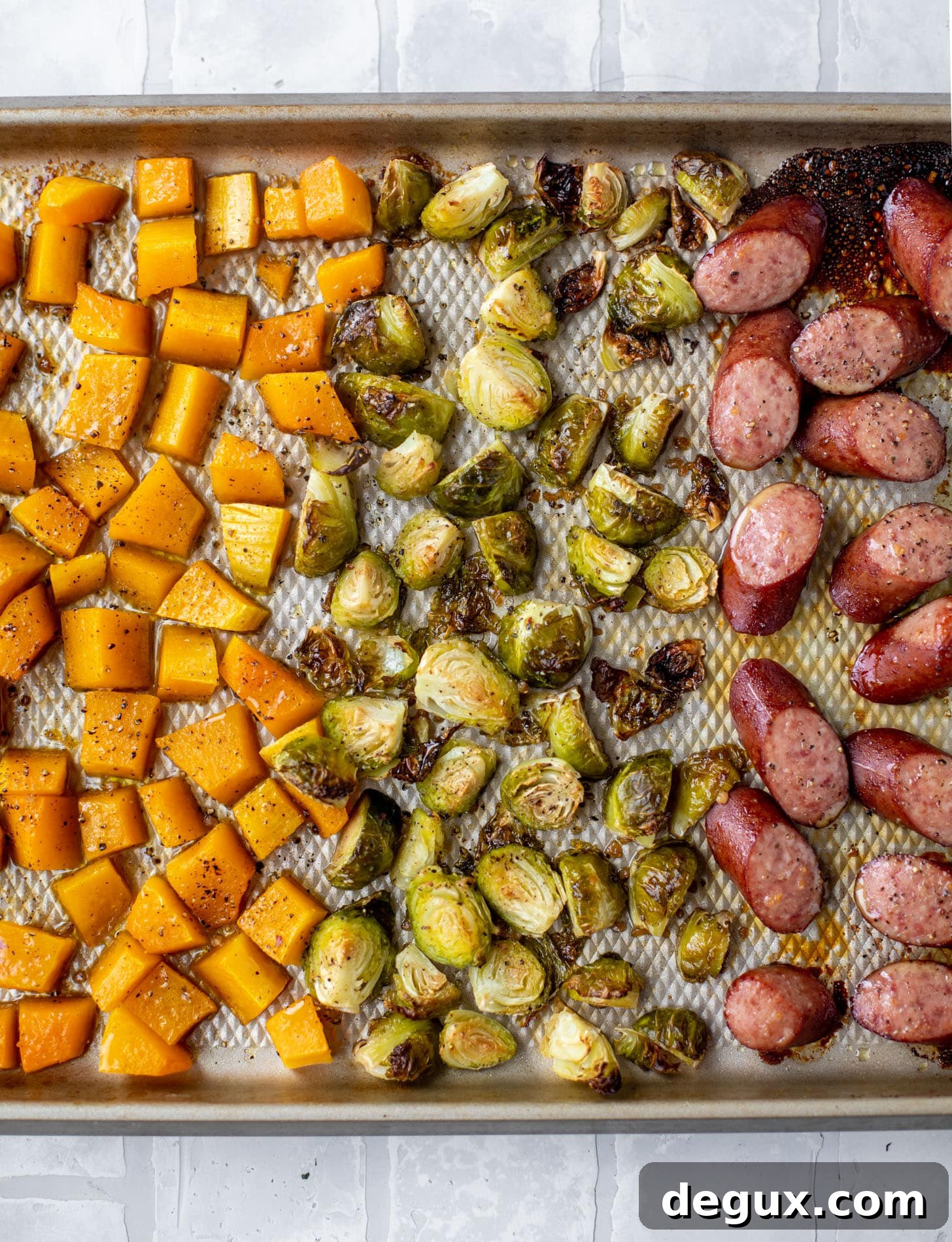 maple sheet pan smoked turkey sausage with butternut squash and brussels sprouts