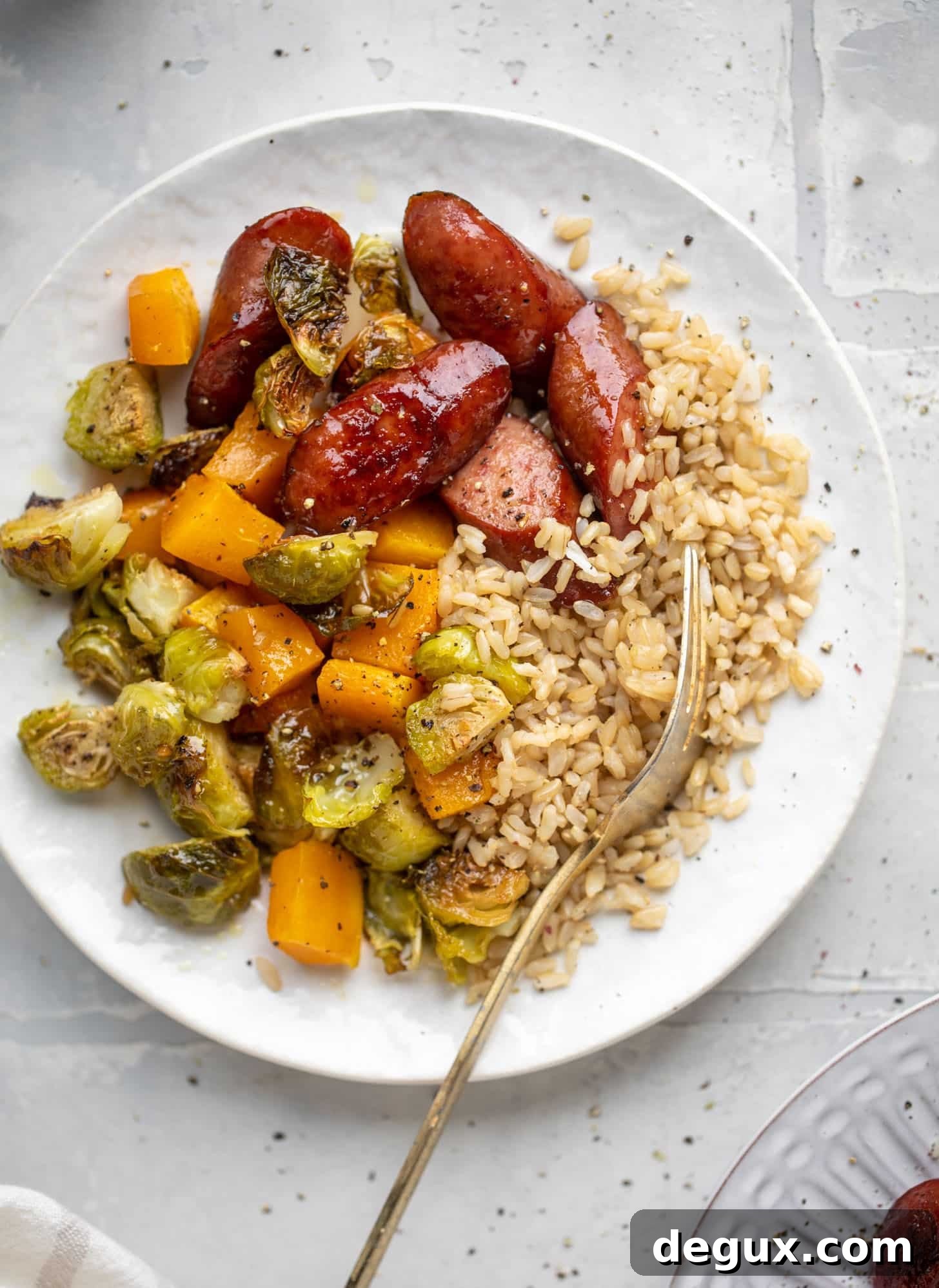 maple sheet pan smoked turkey sausage with butternut squash and brussels sprouts