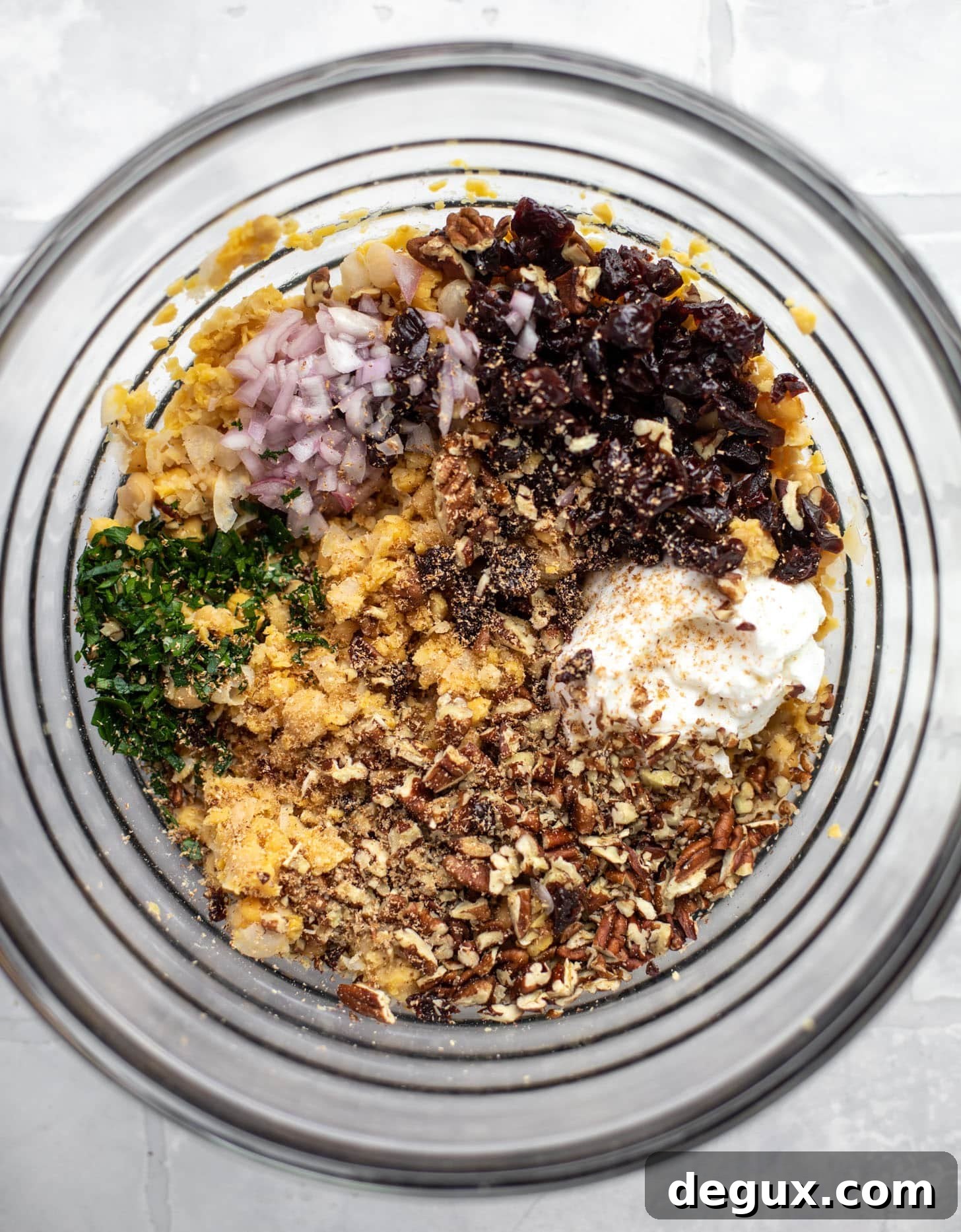 20-Minute Smashed Chickpea Salad for a Quick Flavorful Lunch 4 smashed chickpeas with dried cherries, shallots, herbs, pecans, yogurt and nutmeg