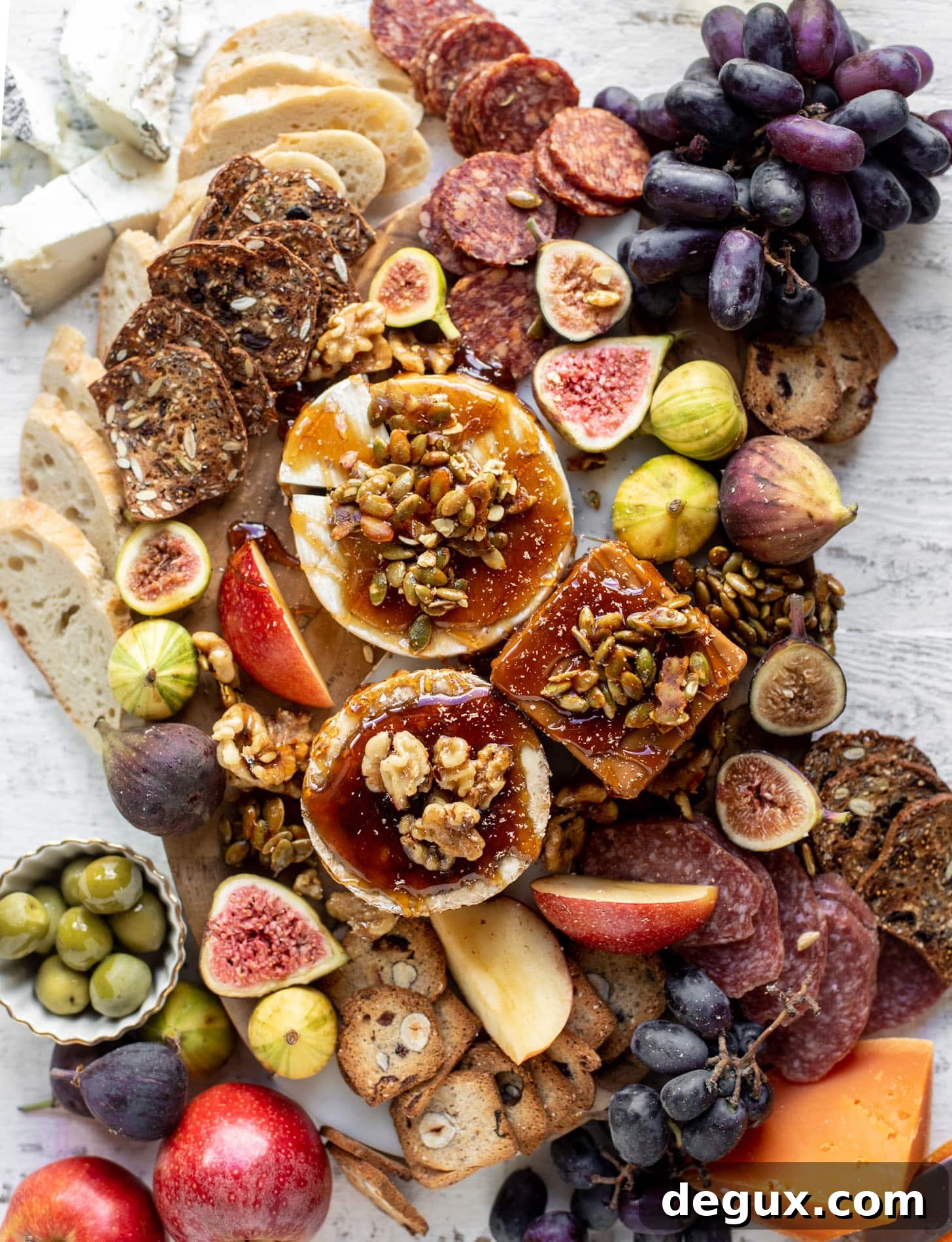 Autumn Cheese Board Featuring Bourbon Crackling Caramel 10 autumn cheese board with bourbon crackling caramel and honey roasted pepitas