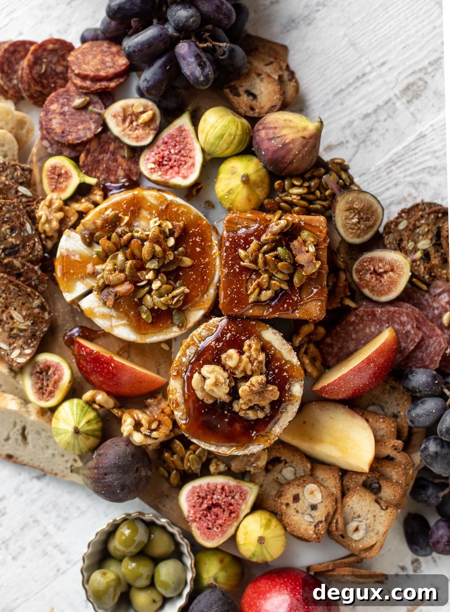Autumn Cheese Board Featuring Bourbon Crackling Caramel 7 autumn cheese board with bourbon crackling caramel and honey roasted pepitas