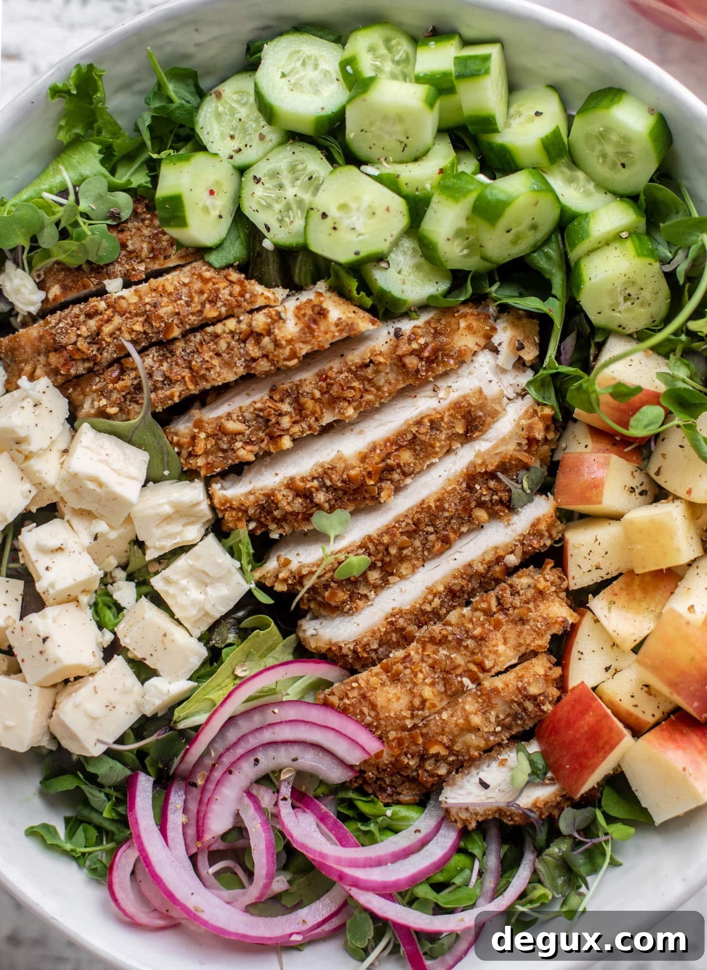 Crunchy Pretzel-Crusted Chicken Salad with Tangy Mustard Vinaigrette 6 pretzel crusted chicken salad with onions, cheese, cucumbers and apples