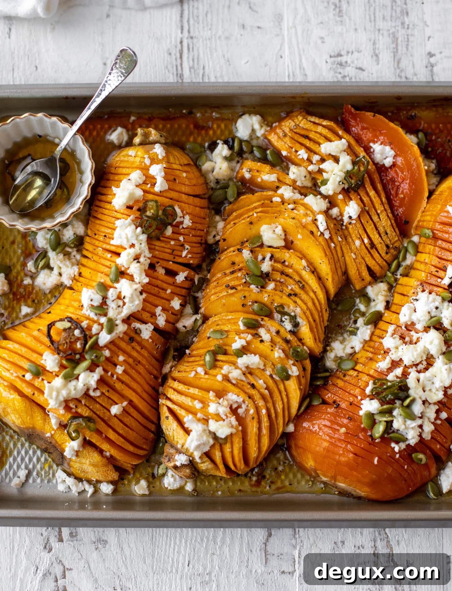 Spicy Honey Hasselback Butternut Squash with Feta & Pepitas 9 hot honey hasselback butternut squash with feta and pepitas