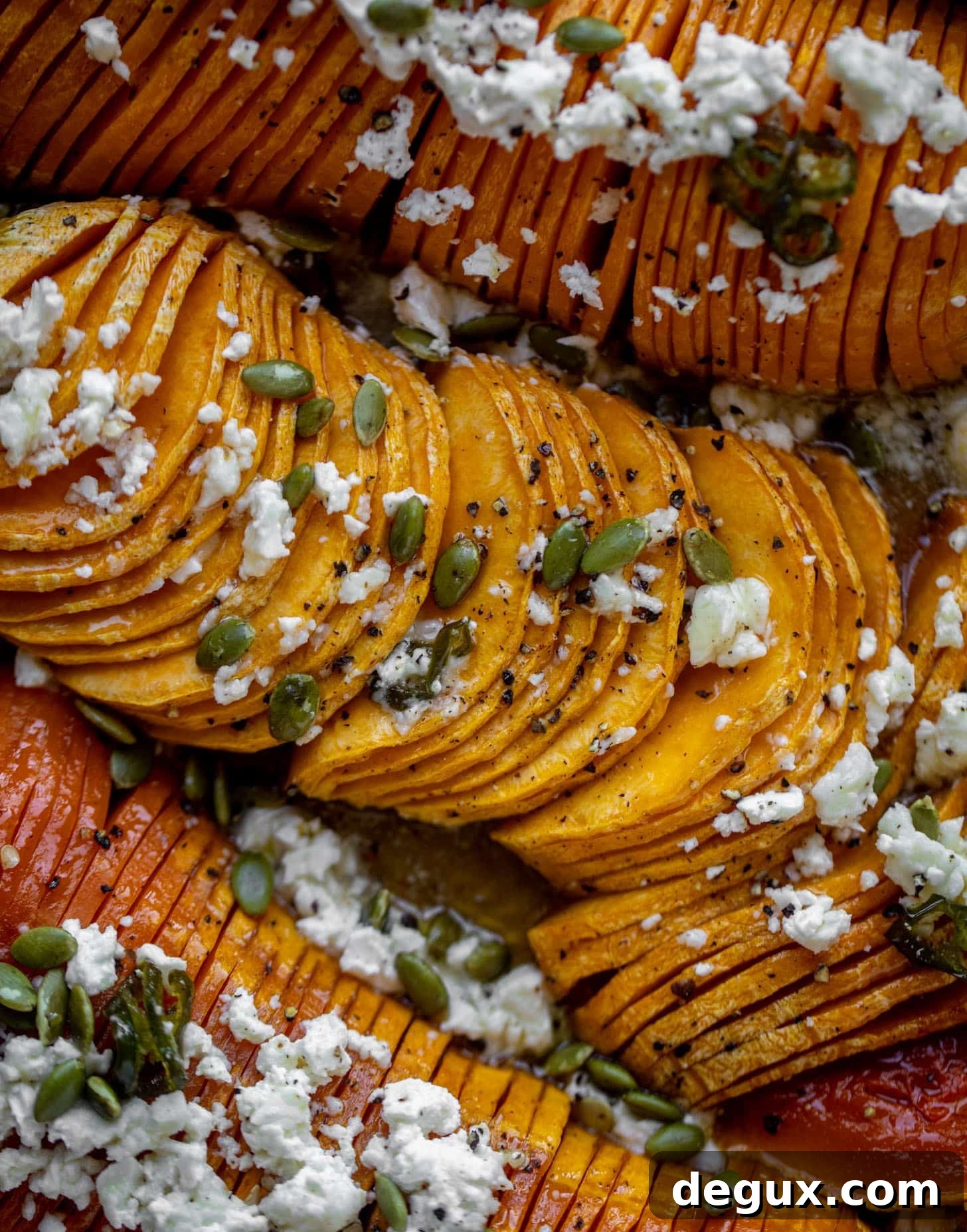 Spicy Honey Hasselback Butternut Squash with Feta & Pepitas 10 hot honey hasselback butternut squash with feta and pepitas