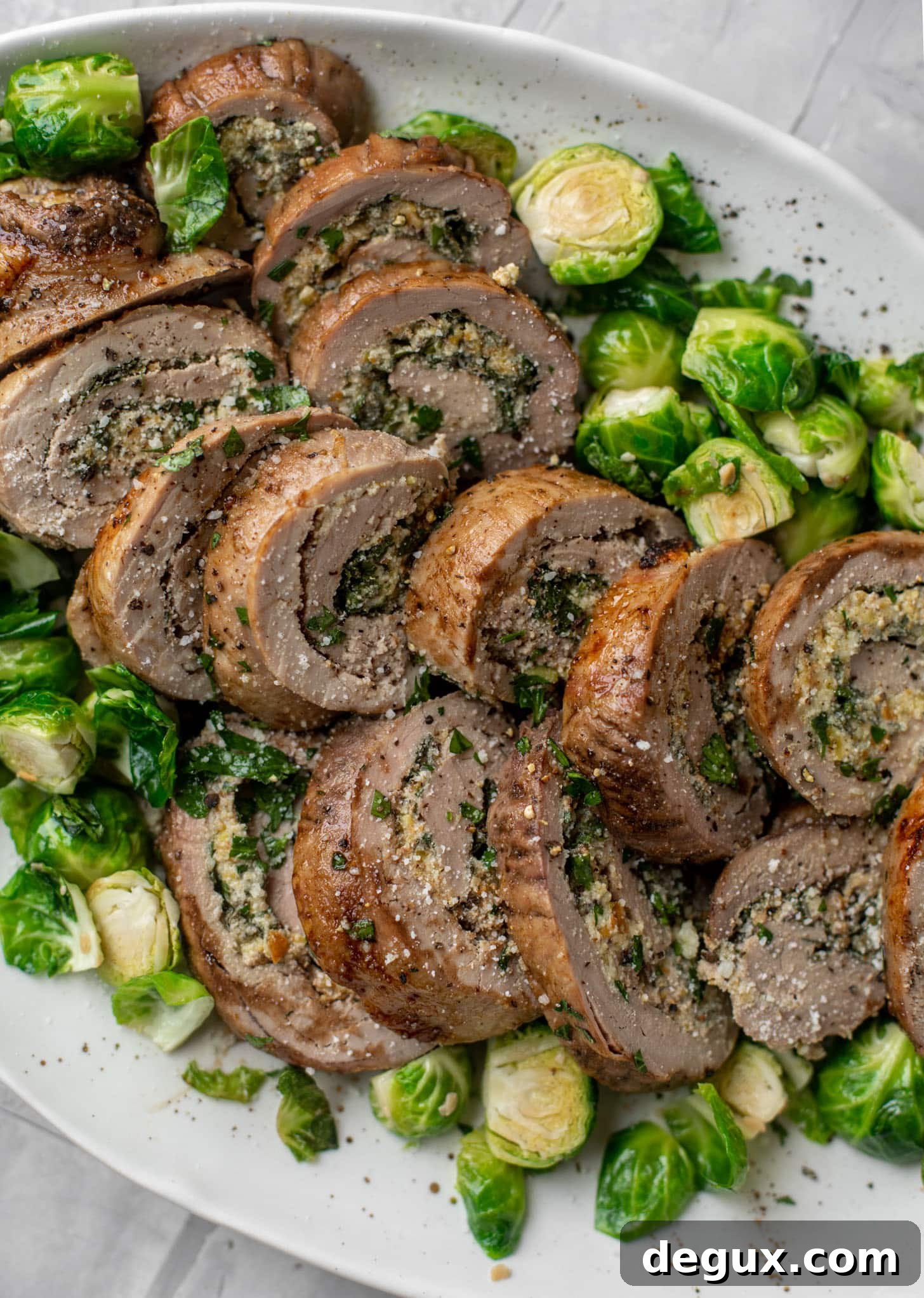 parmesan pistachio stuffed pork tenderloin with brussels sprouts