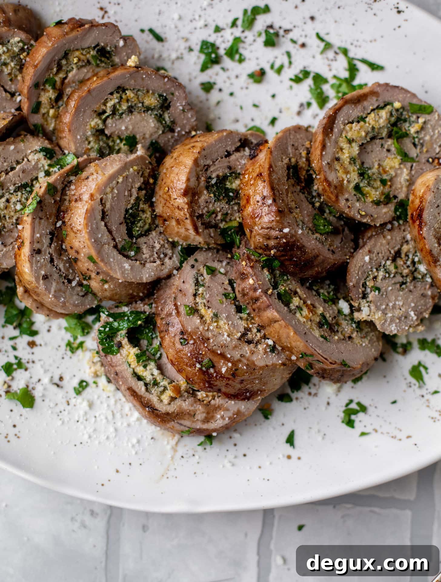 parmesan pistachio stuffed pork tenderloin with brussels sprouts