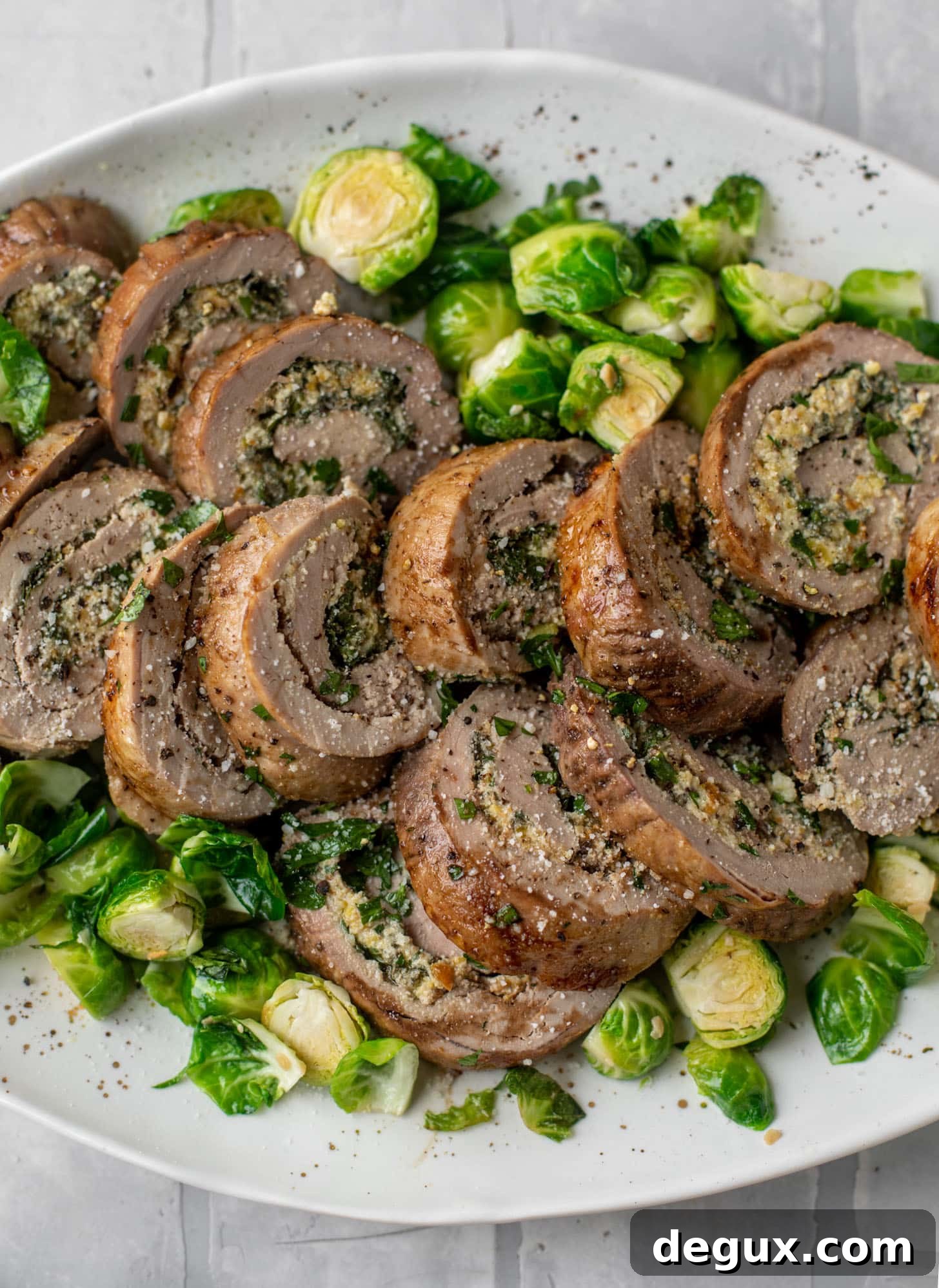parmesan pistachio stuffed pork tenderloin with brussels sprouts
