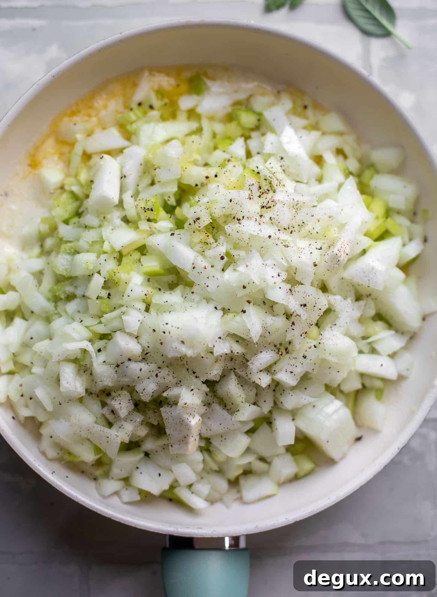 butter, onion, celery in a skillet