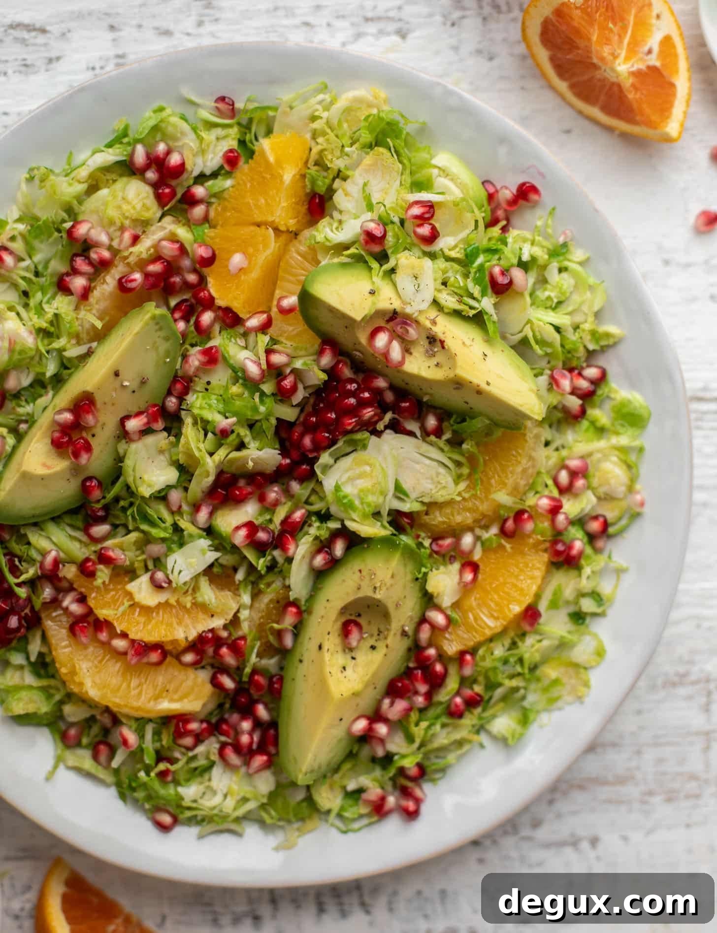 Citrus Shredded Brussels Sprouts Salad with Avocado & Pomegranate 6 shredded citrus brussels sprouts salad with avocado and pomegranate