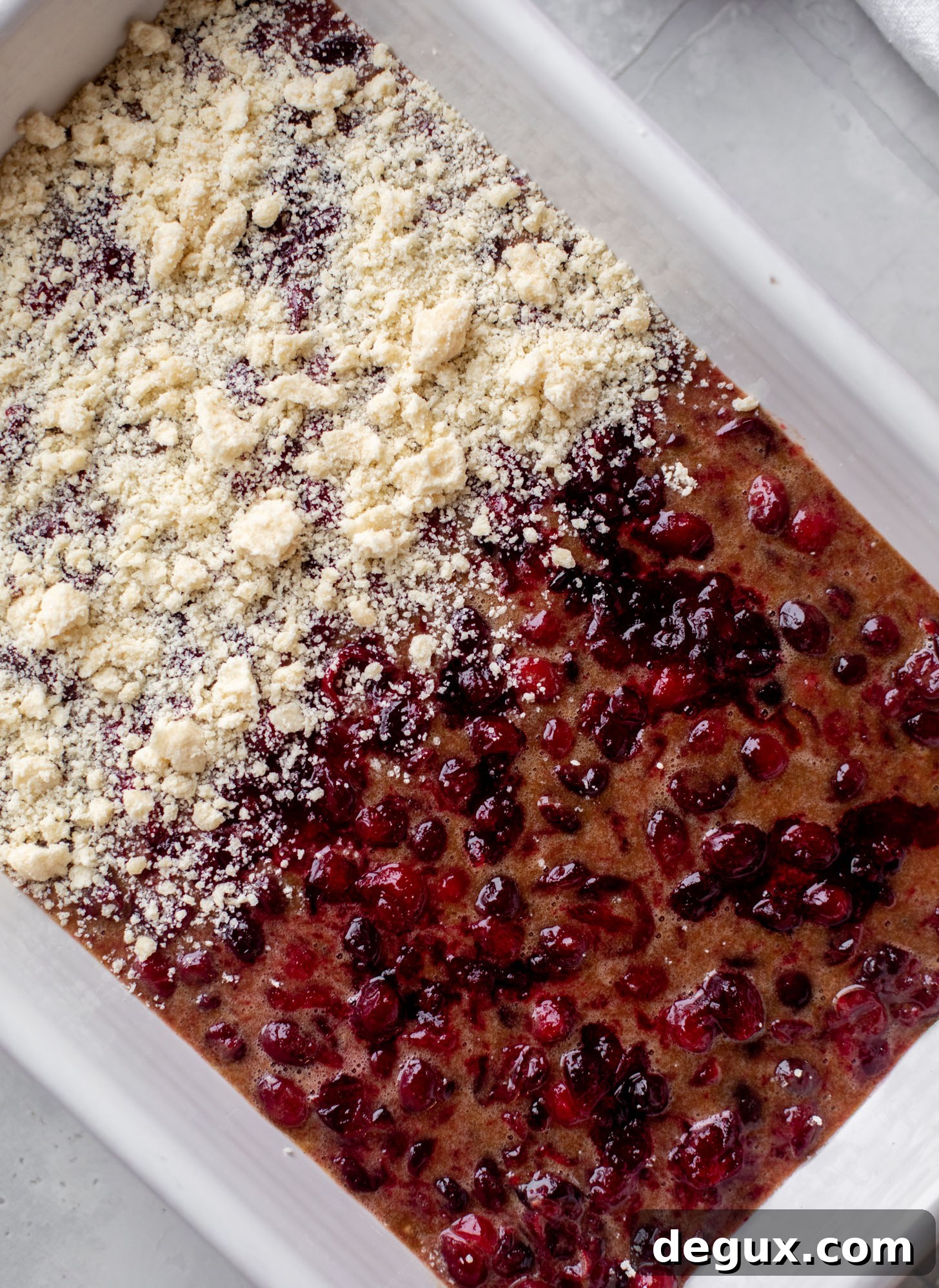 Cranberry Cobbler Bars Recipe: Chewy-Topped Holiday Dessert 6 cranberry cobbler bars before baking