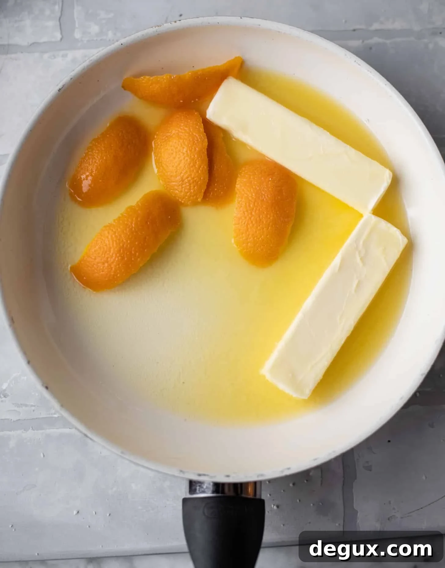 melting butter and orange rind
