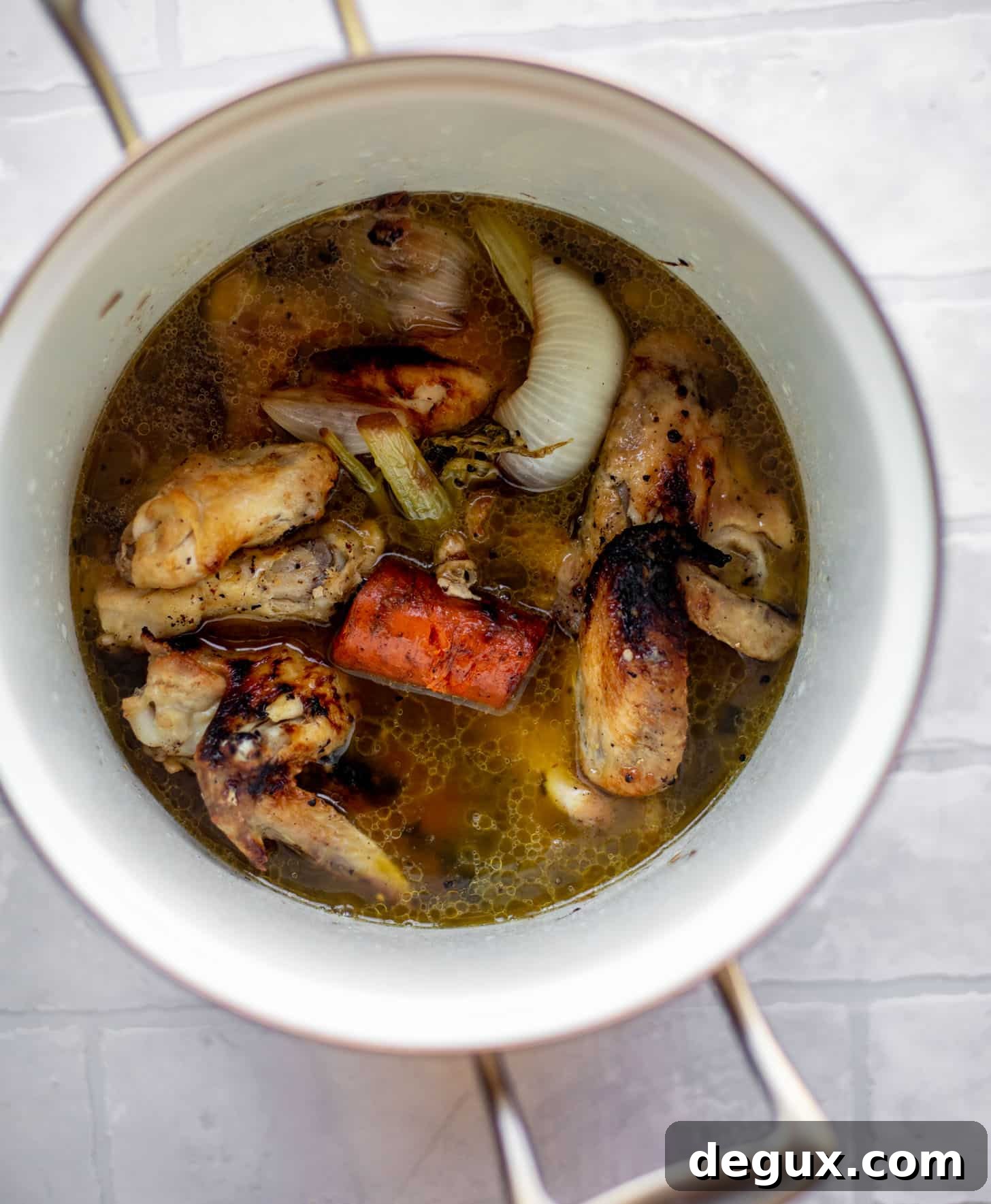 stock with wings and vegetables