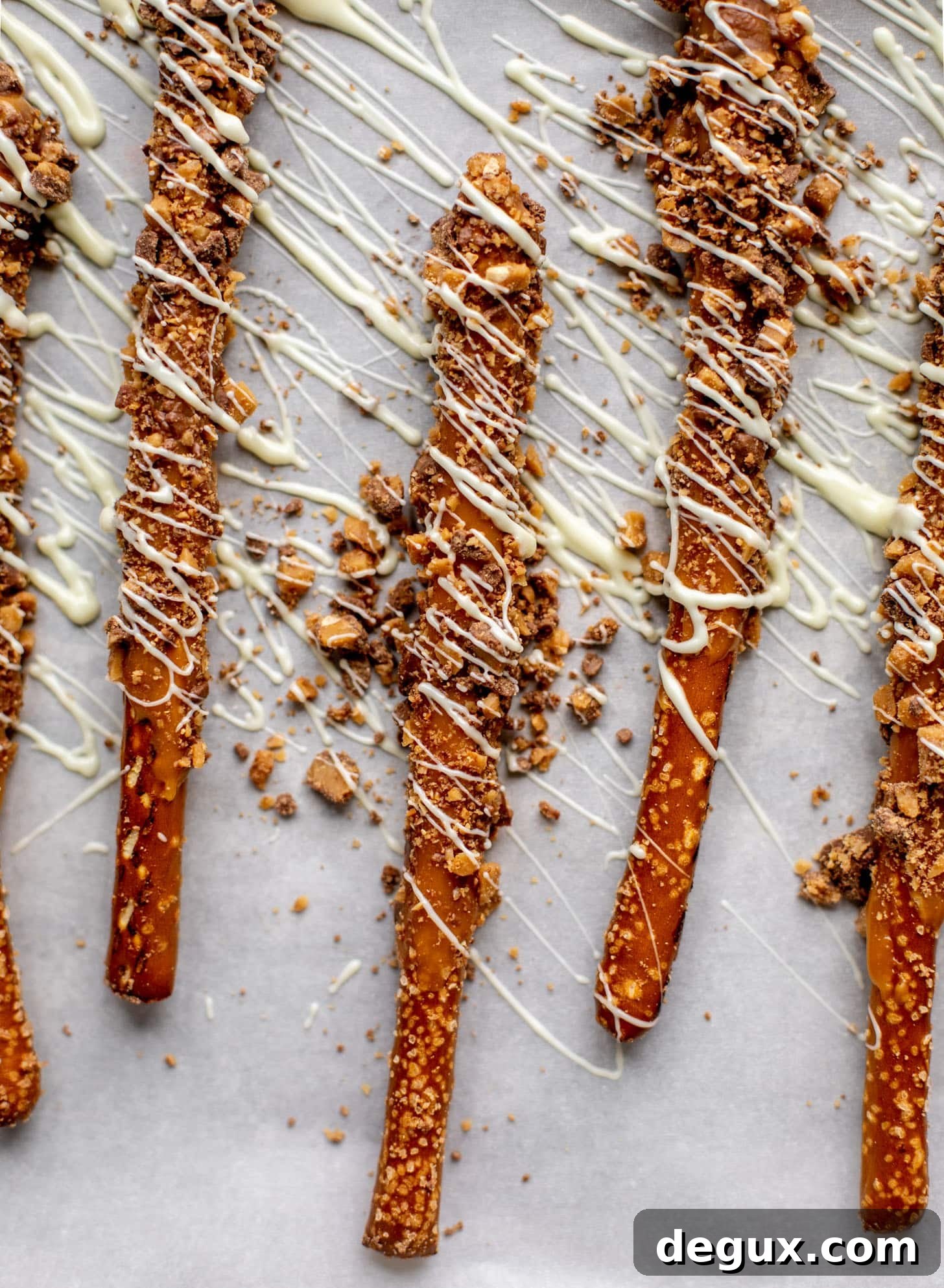 caramel pretzels drizzled with white chocolate