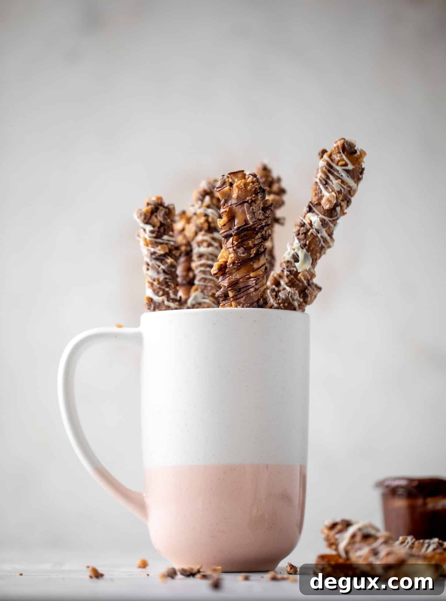 caramel pretzels in a mug