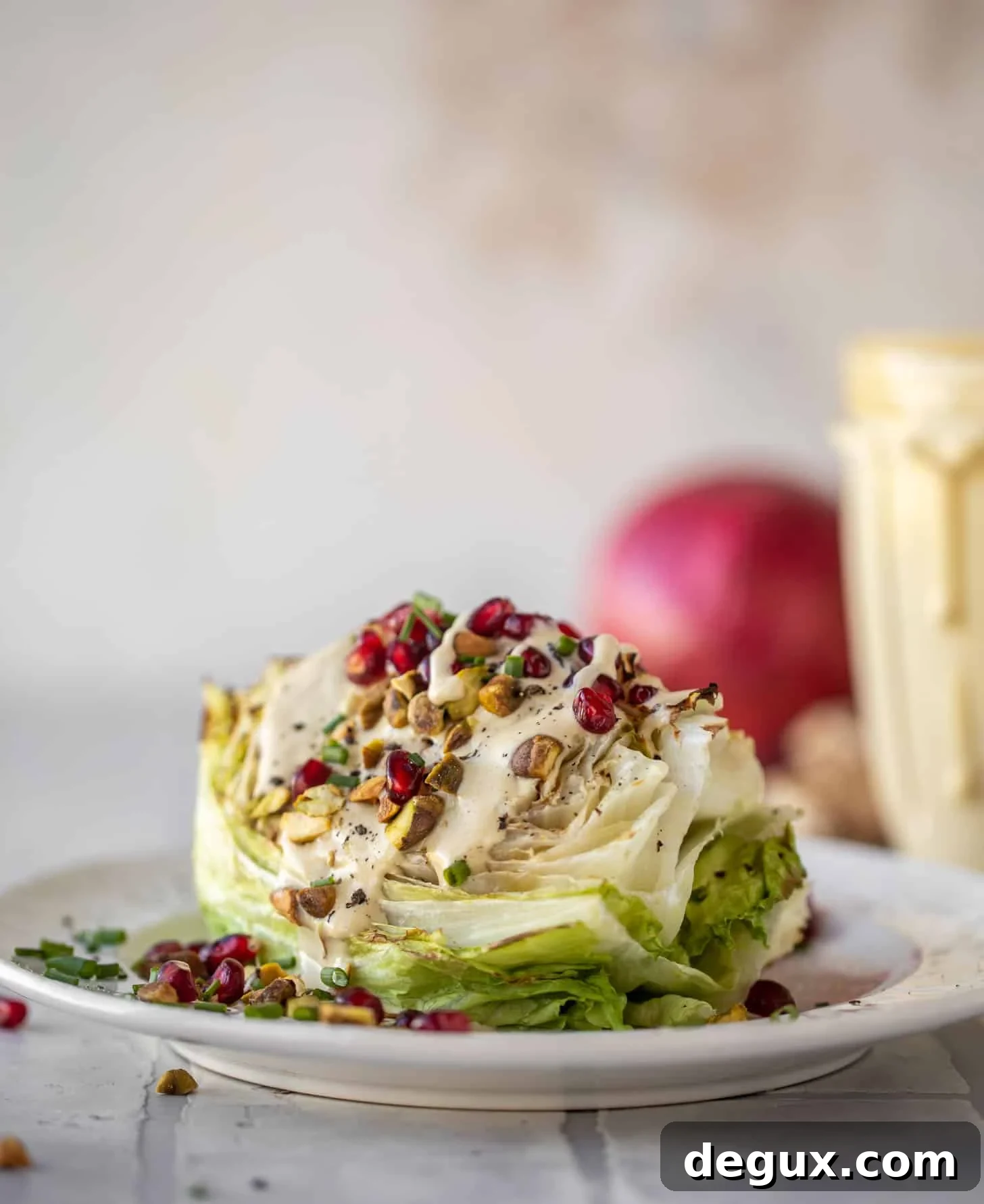 Broiled Iceberg Wedge Salad with Pomegranate Seeds & Pistachios 7 broiled wedge salad with pomegranates and pistachios