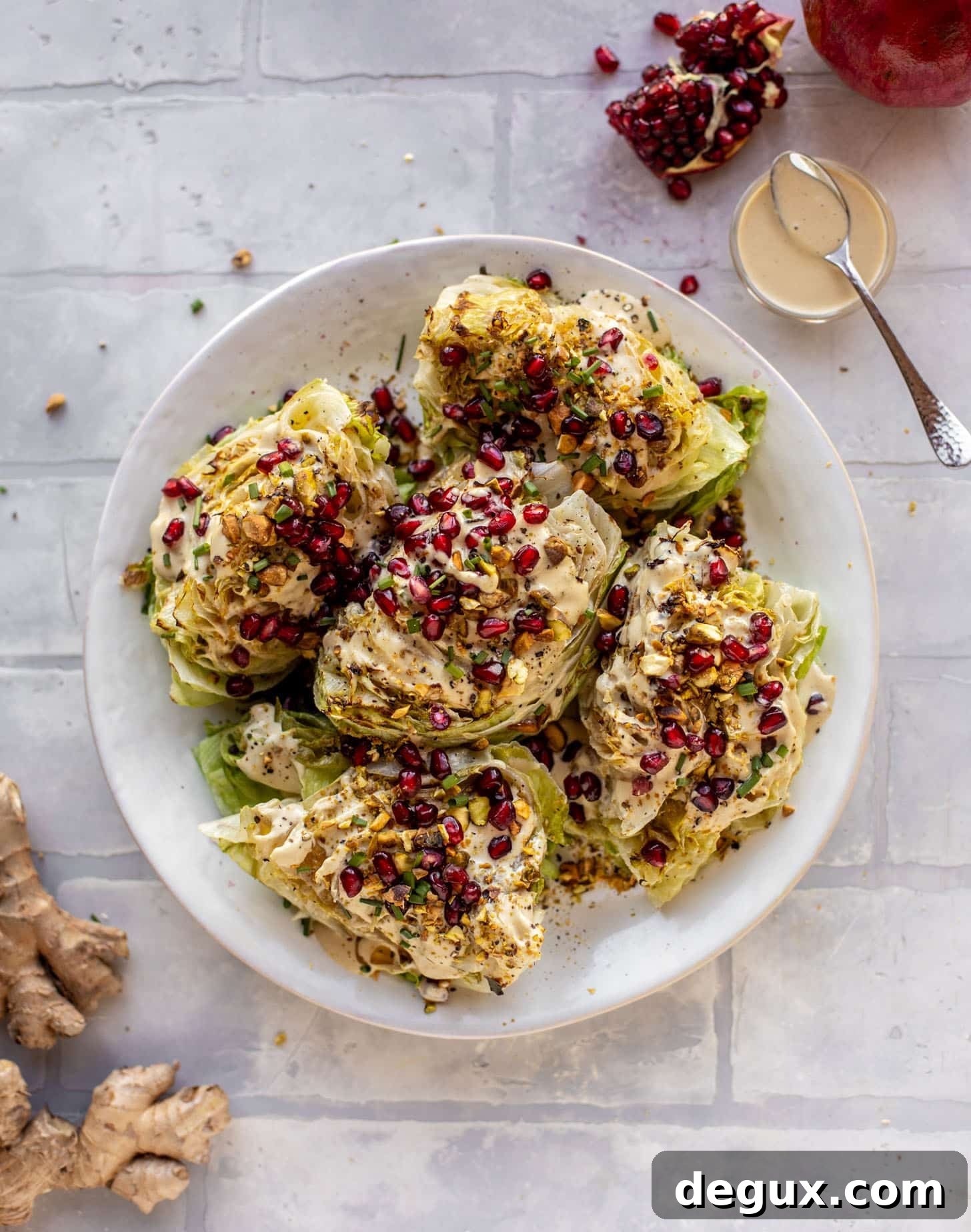 Broiled Iceberg Wedge Salad with Pomegranate Seeds & Pistachios 8 broiled wedge salad with pomegranates and pistachios
