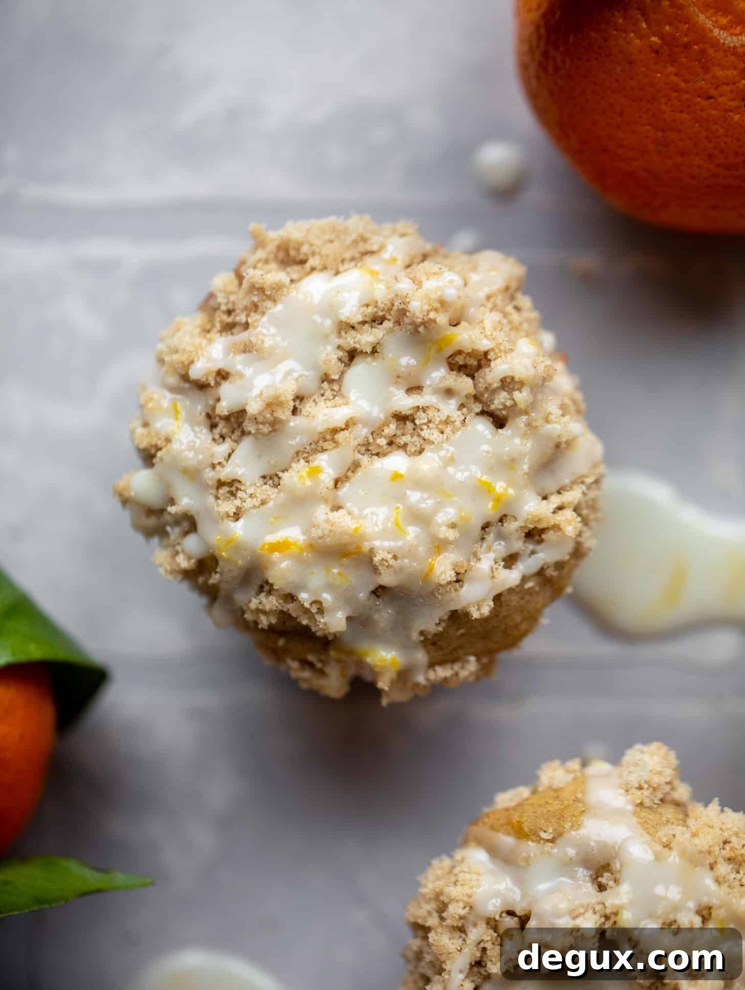 Orange Cinnamon Coffee Cake Muffins — Zesty Streusel Muffins 3 orange cinnamon coffee cake muffins with orange glaze