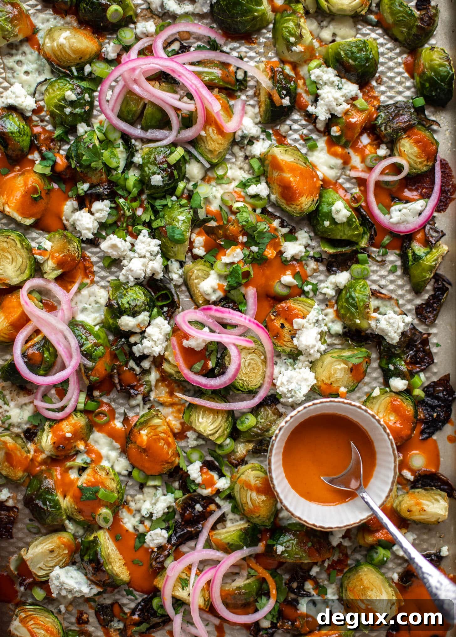 Spicy Buffalo-Style Roasted Brussels Sprouts with Crispy Edges 2 roasted buffalo wing brussels sprouts