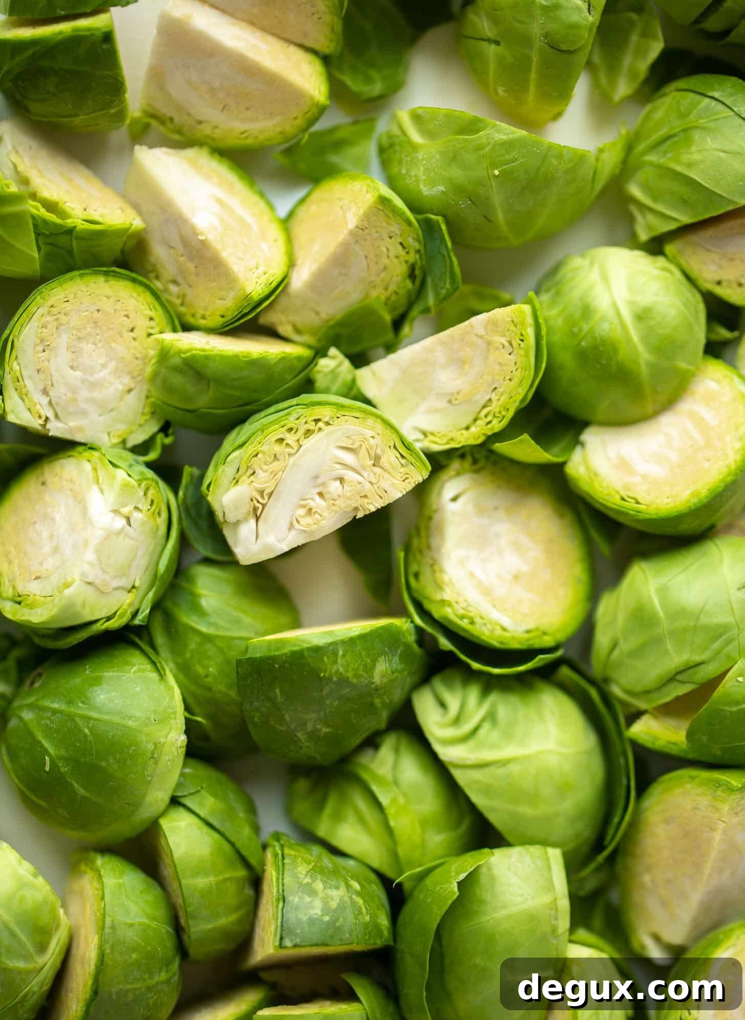 Spicy Buffalo-Style Roasted Brussels Sprouts with Crispy Edges 3 chopped brussels sprouts