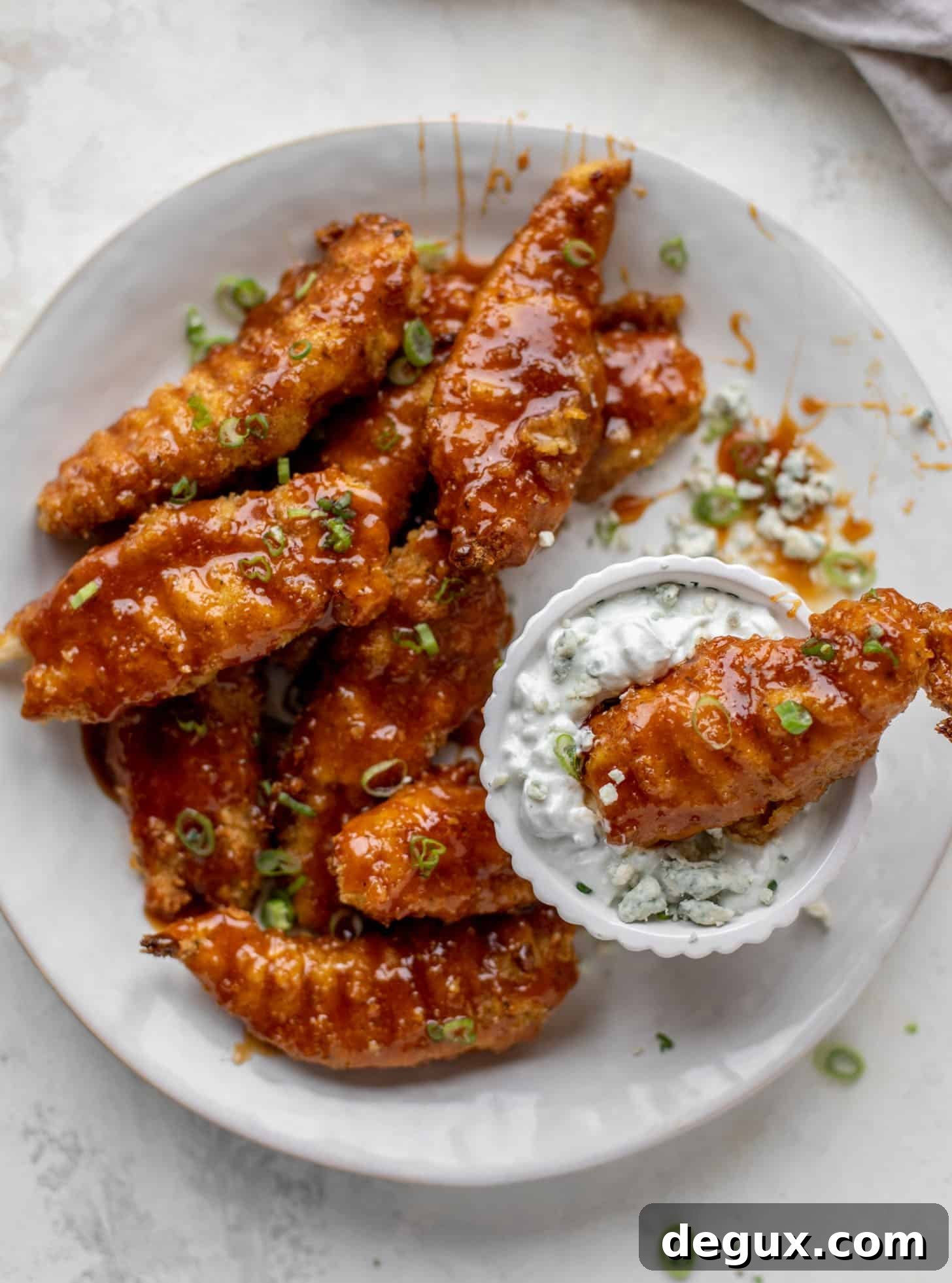 sticky chicken fingers with yogurt blue cheese sauce
