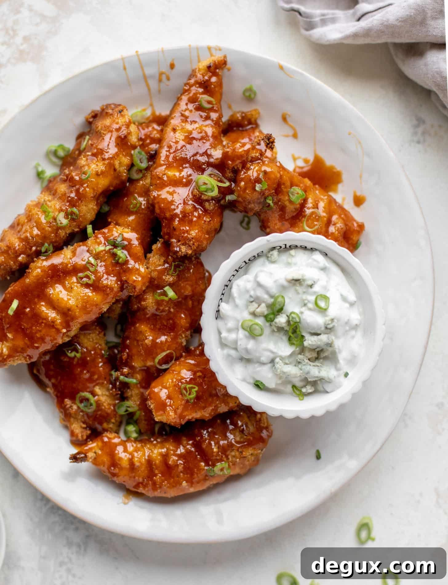 sticky chicken fingers with yogurt blue cheese sauce