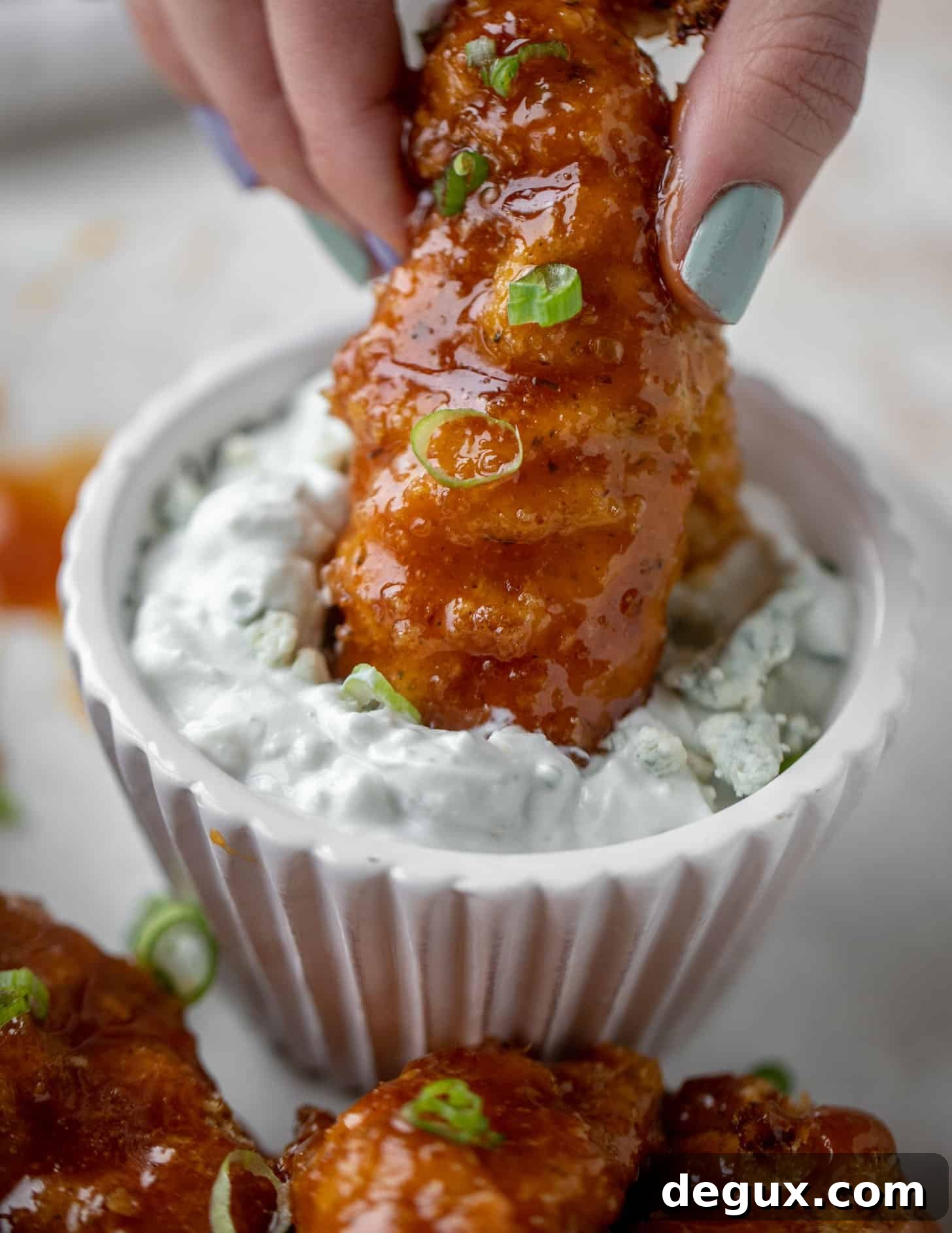 sticky chicken fingers with yogurt blue cheese sauce