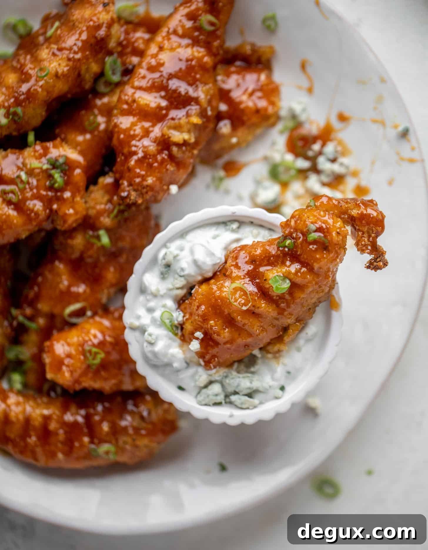 sticky chicken fingers with yogurt blue cheese sauce