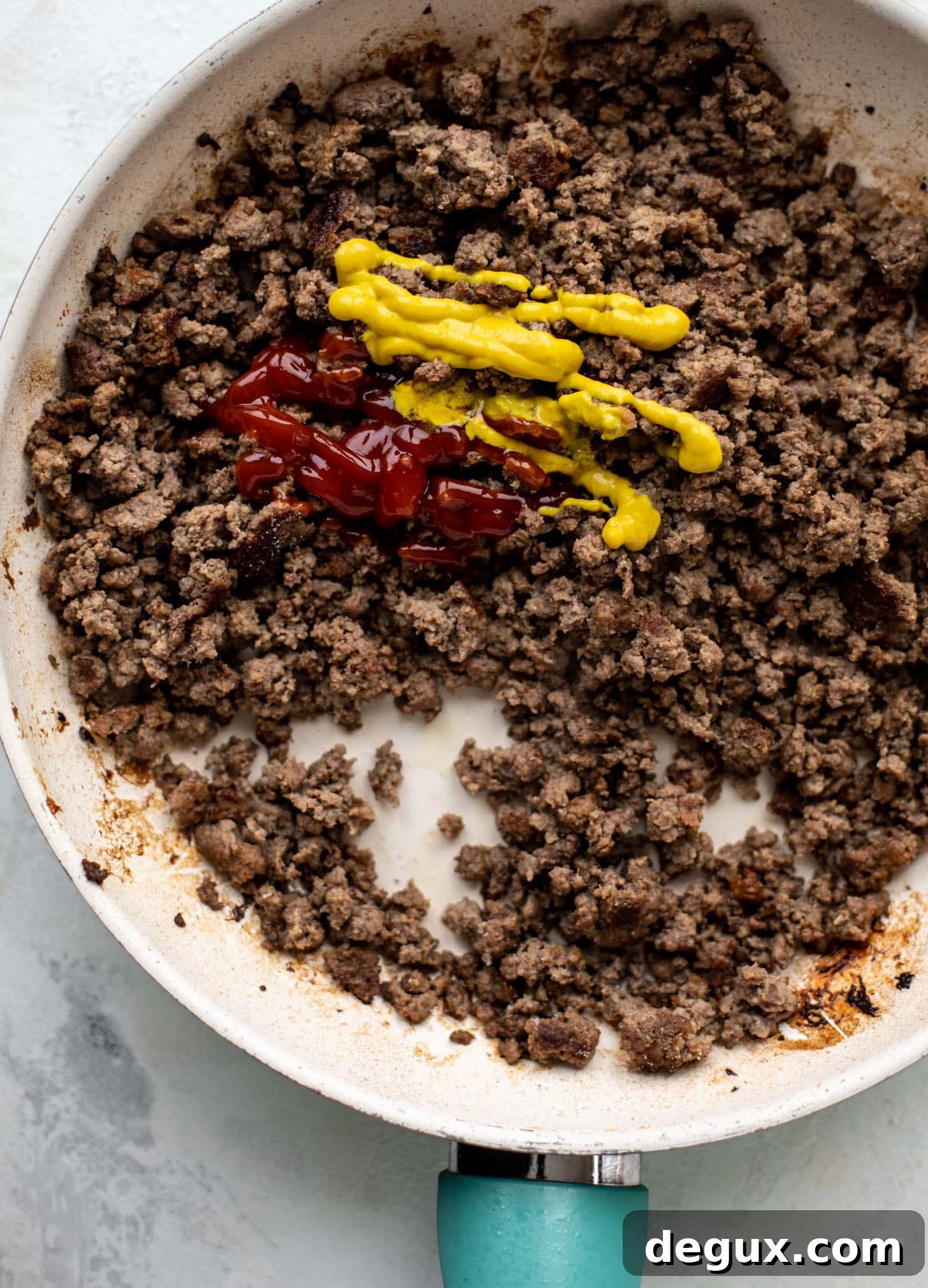 ground beef with ketchup and mustard