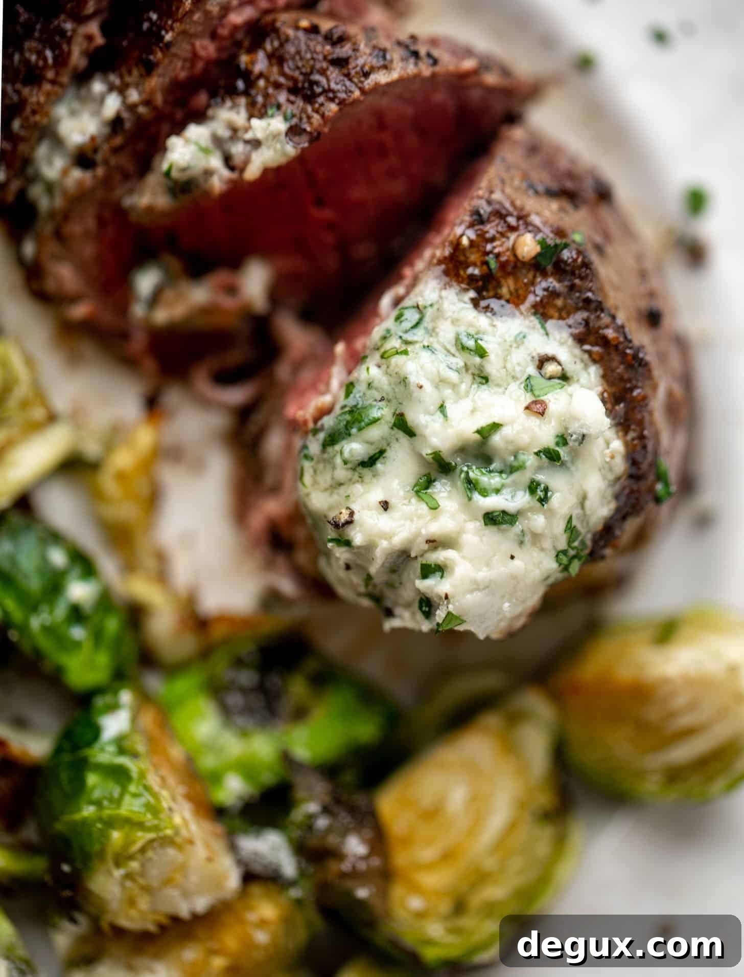 Seared Filet Mignon with Blue Cheese Butter 10 filet mignon with blue cheese butter and cacio e pepe brussels