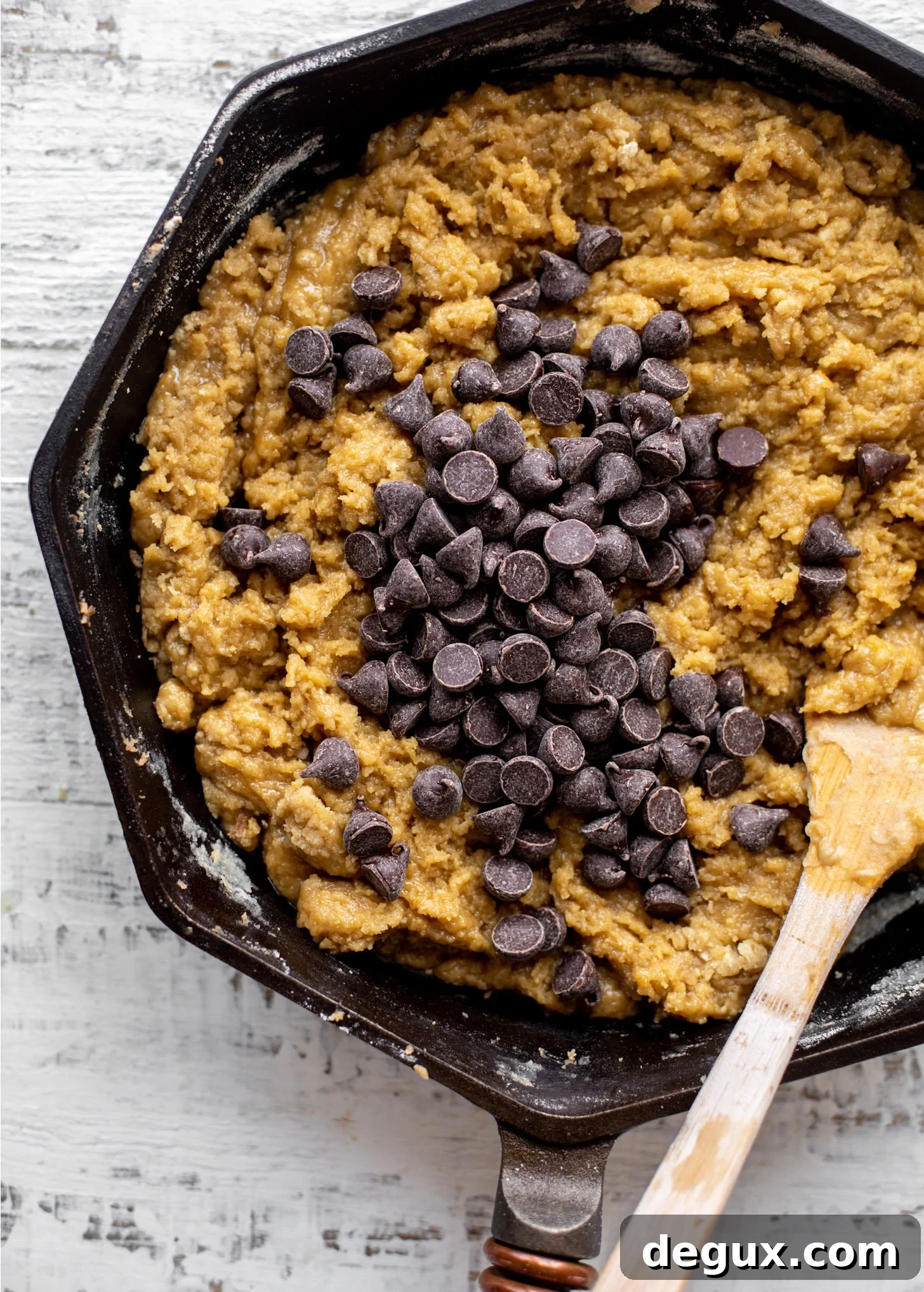 cookie dough and chocolate chips in skillet