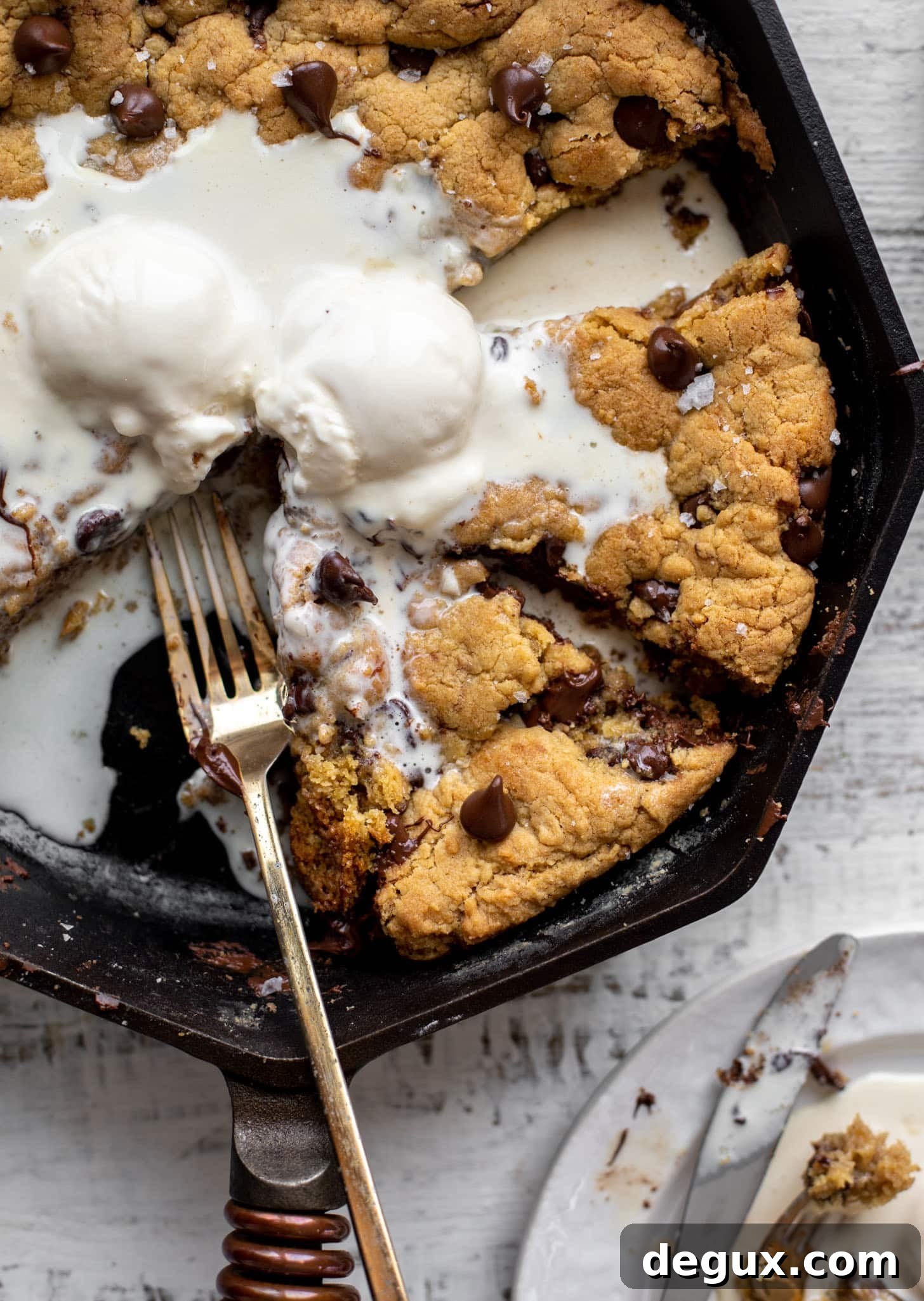 chewy chocolate chip skillet cookie with ice cream