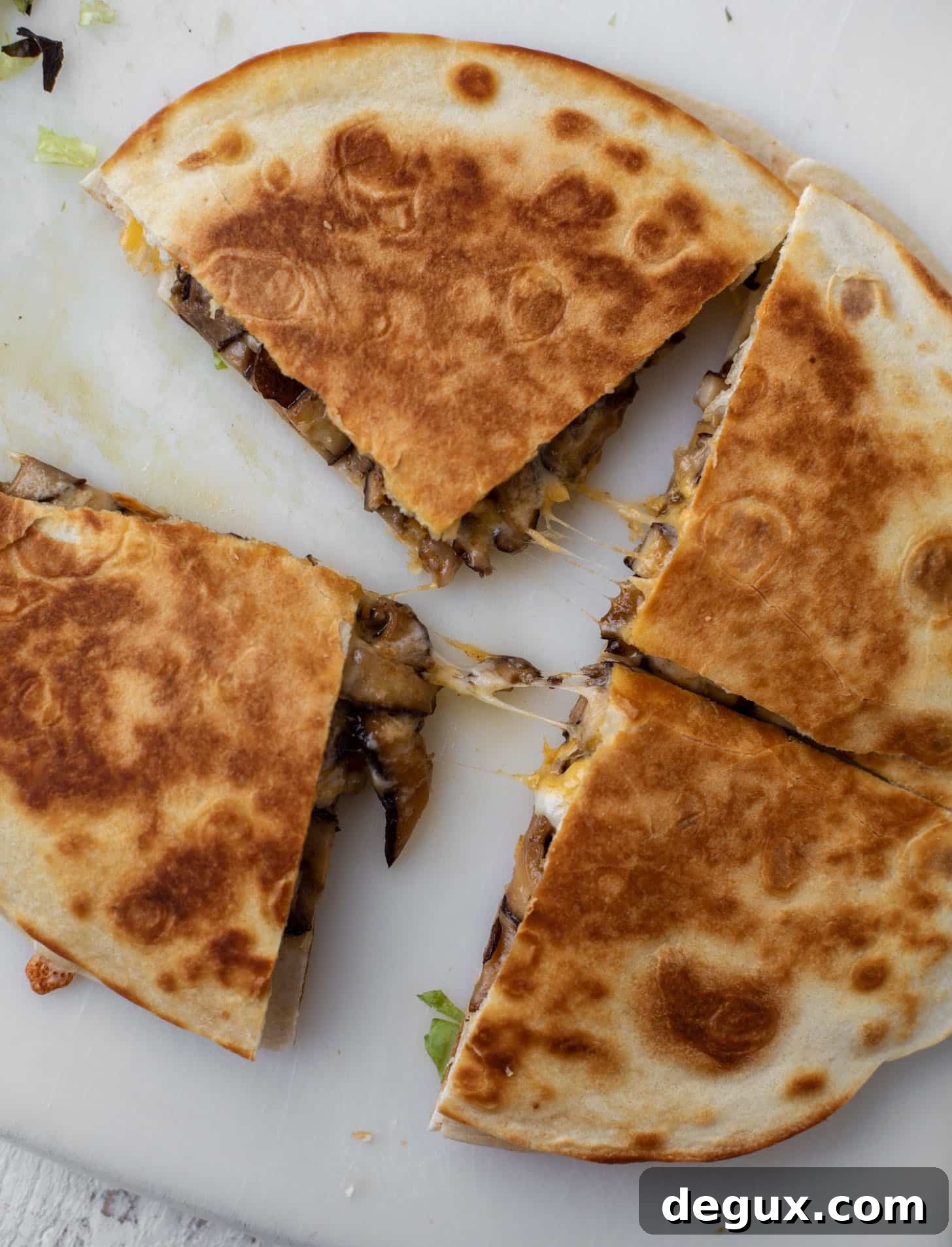 Smoky Shiitake Mushroom Quesadillas with Avocado Cream Sauce 6 crispy, cheesy quesadilla