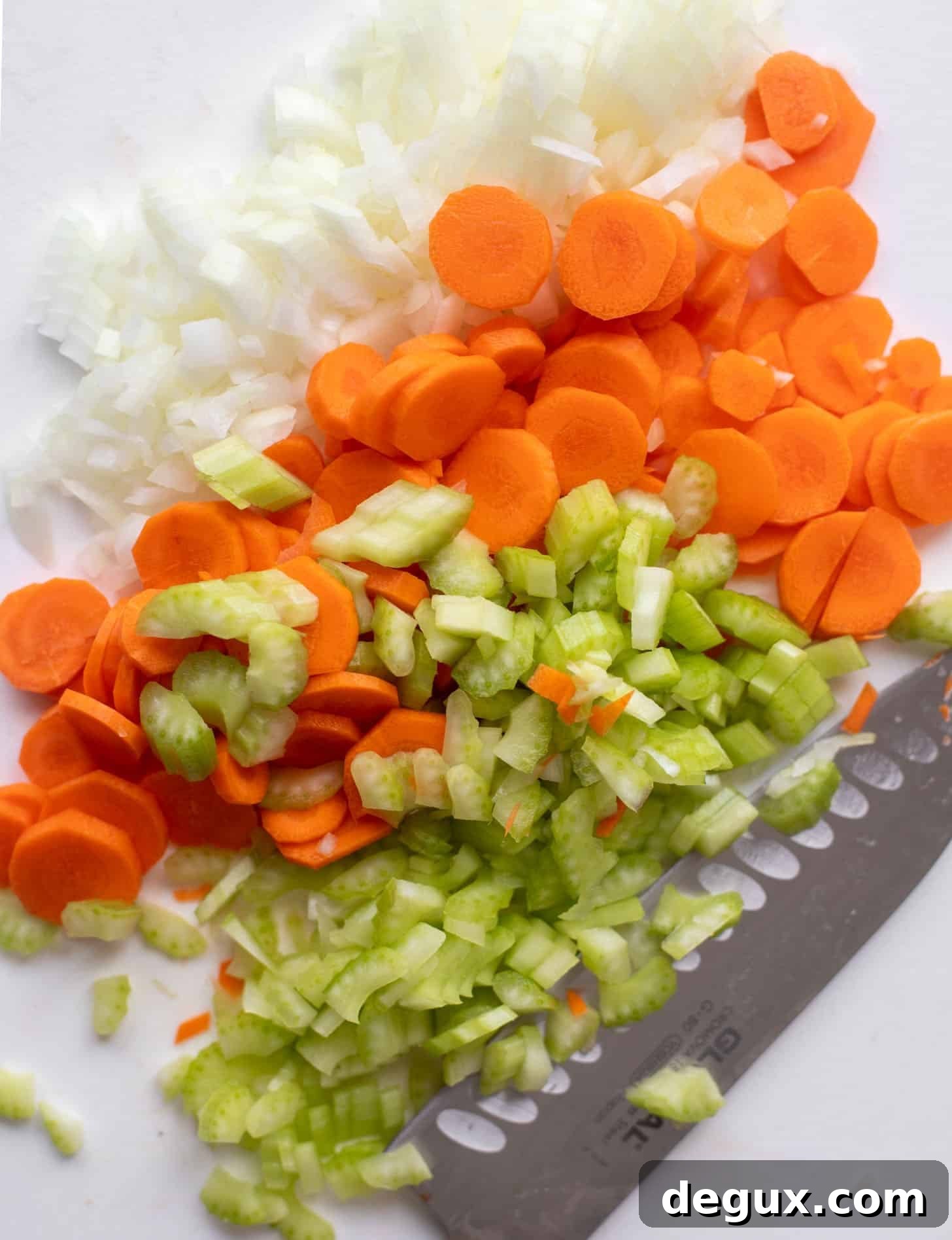 Creamy Chicken and Orzo Soup Recipe for Cozy Weeknight Meals 3 chopped celery, carrots and onion
