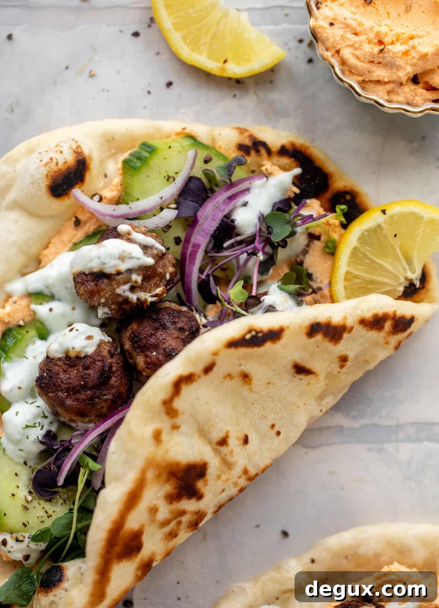 Chicken Meatball Pitas with Roasted Red Pepper Whipped Feta Recipe 7 chicken meatball pitas with roasted red pepper whipped feta