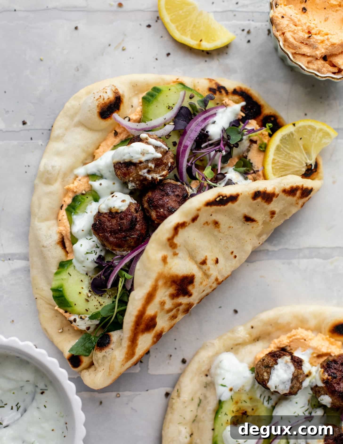 Chicken Meatball Pitas with Roasted Red Pepper Whipped Feta Recipe 10 chicken meatball pitas with roasted red pepper whipped feta