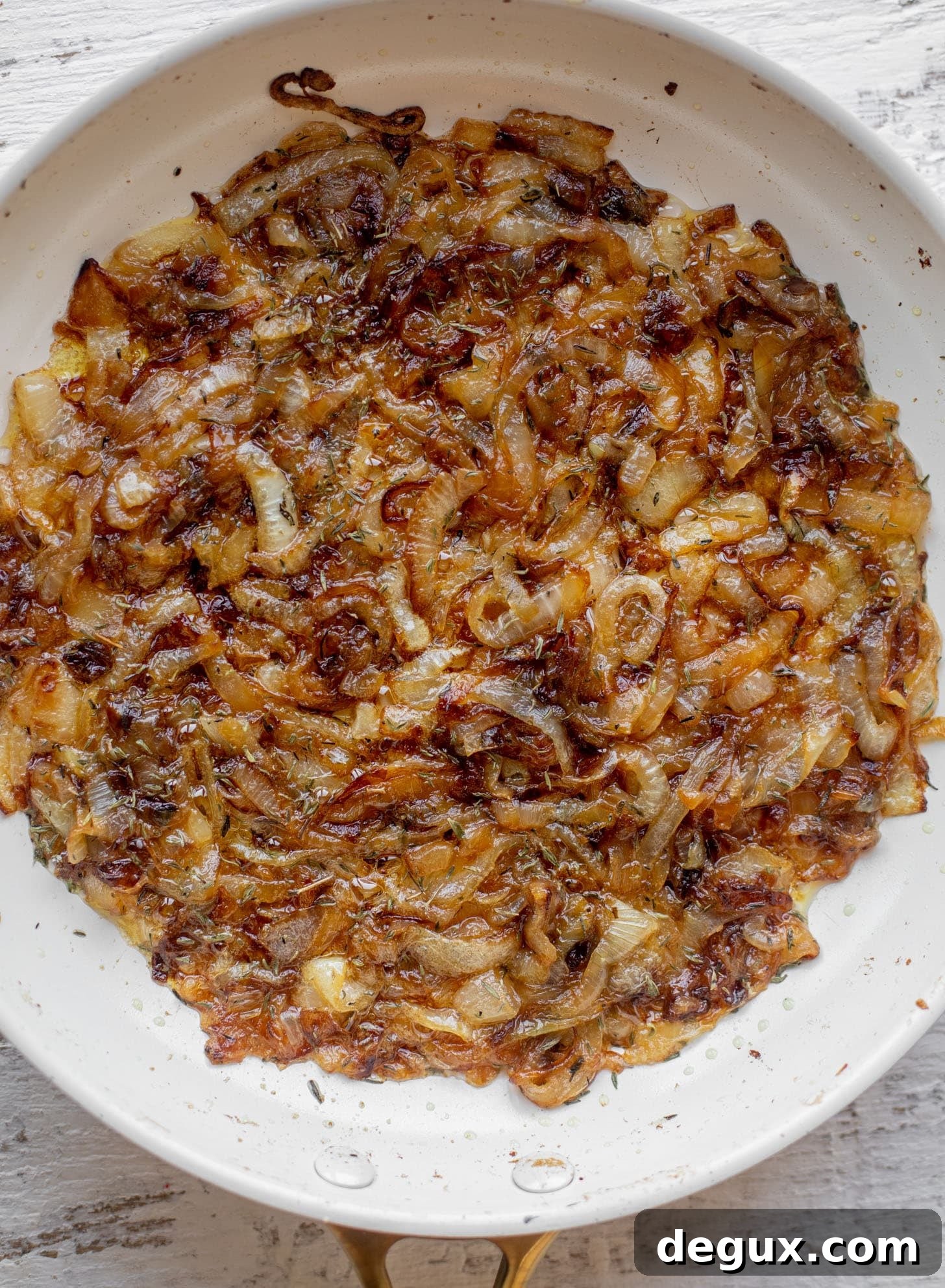 Creamy French Onion Scalloped Potatoes Recipe 3 caramelized onions in a skillet