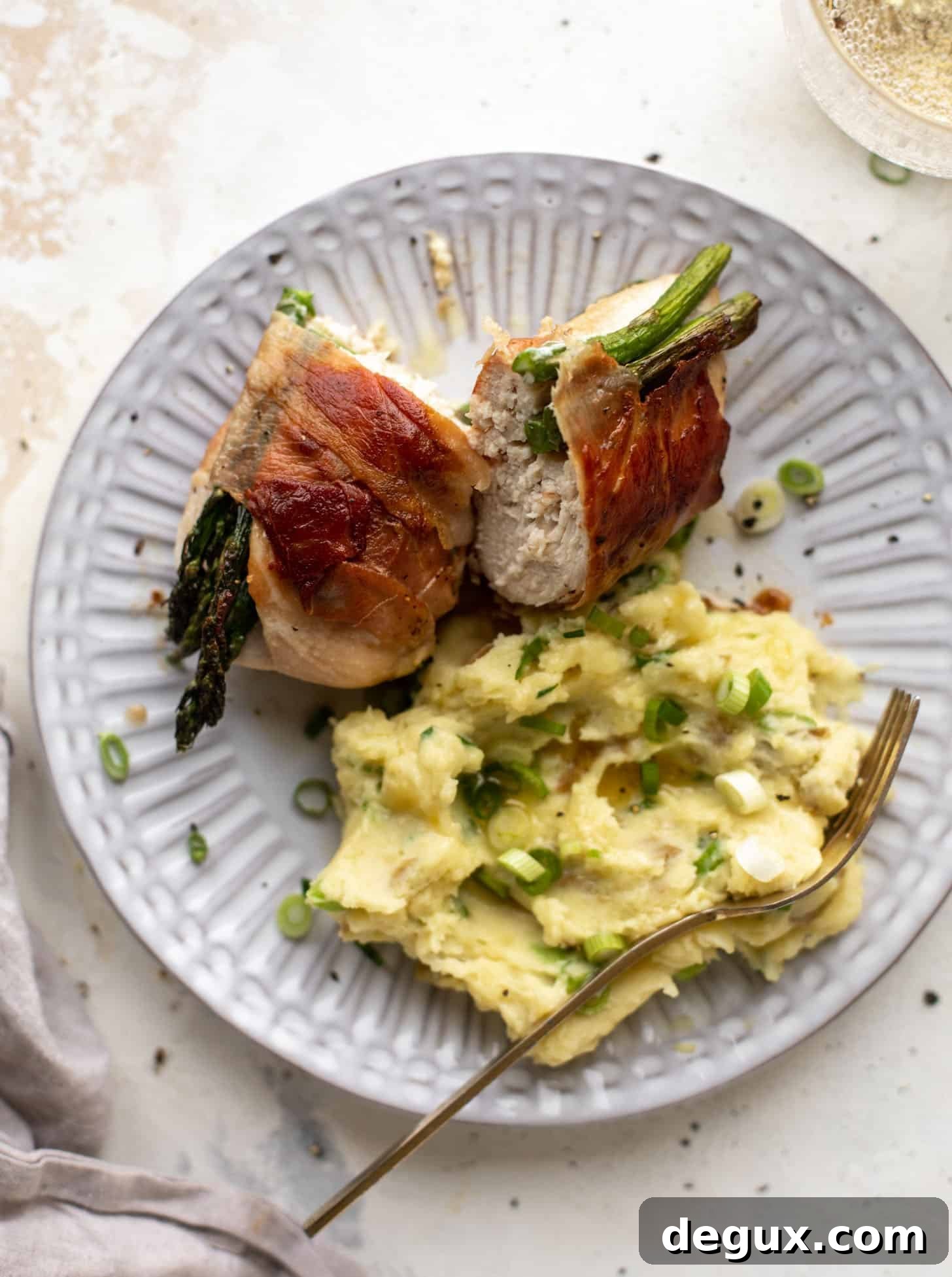 prosciutto wrapped asparagus stuffed chicken with scallion smashed potatoes