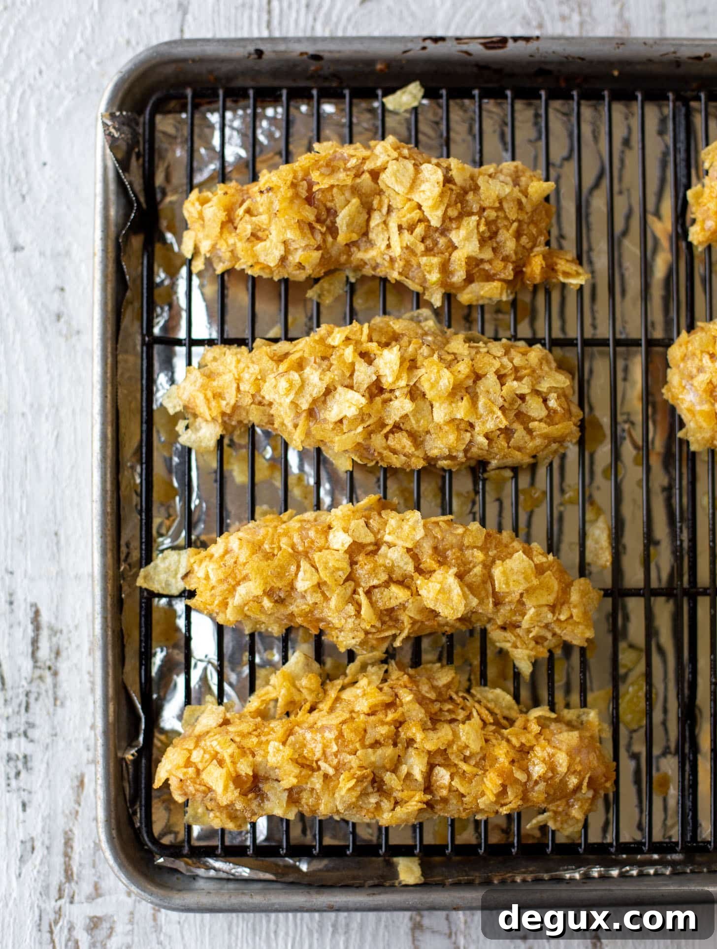 potato chip crusted chicken fingers ready to bake