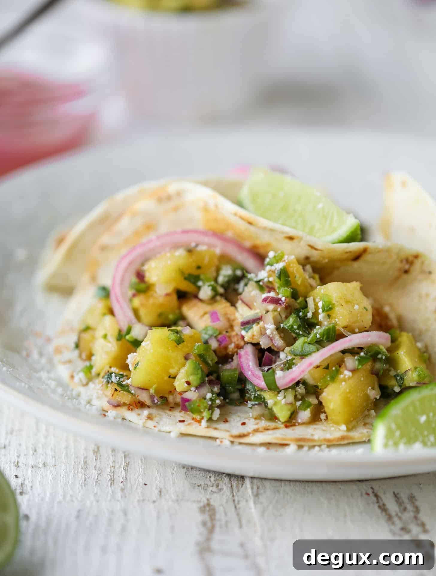 grilled chili lime chicken tacos with pineapple salsa and pickled onions