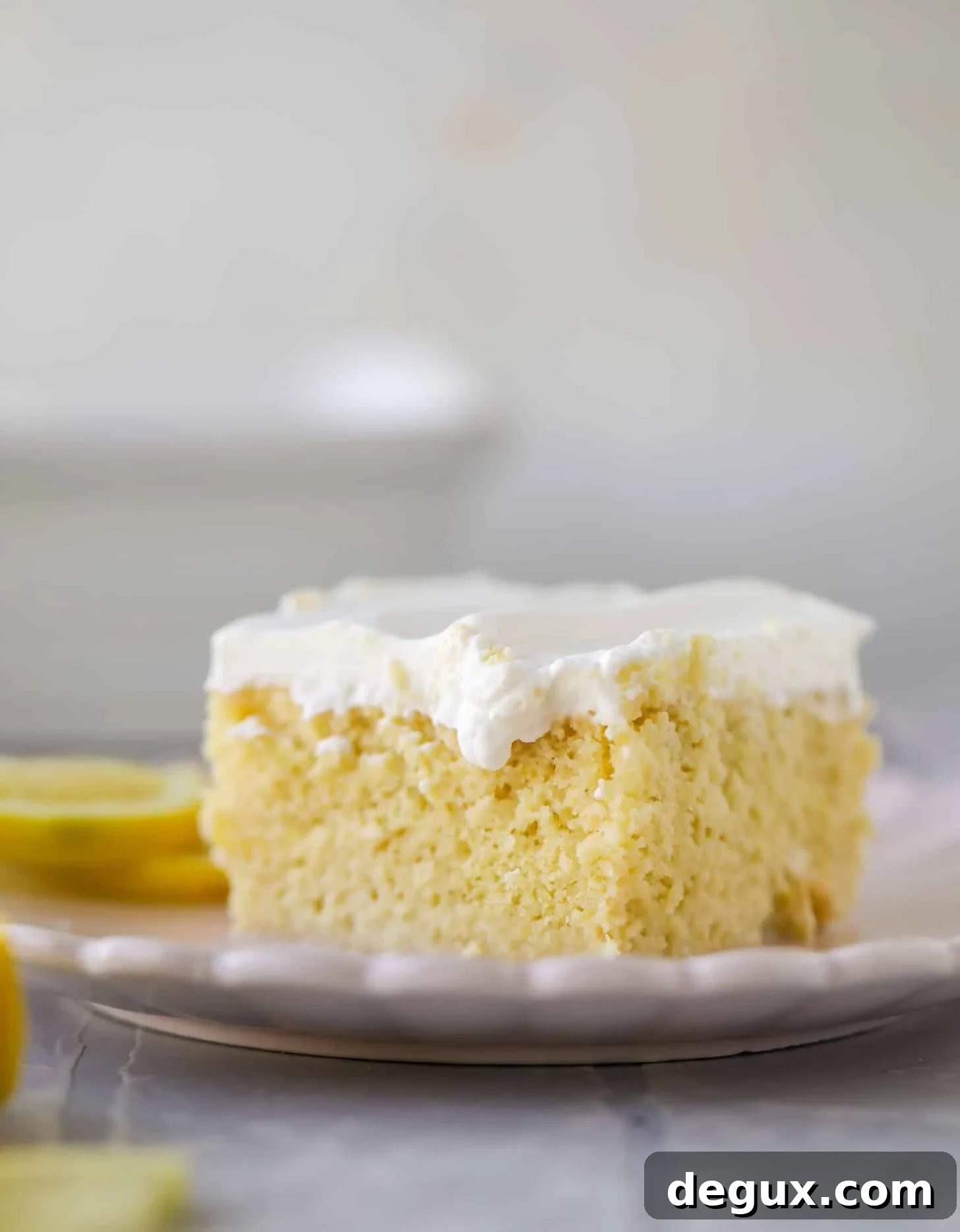 simple lemon tres leches cake with whipped cream