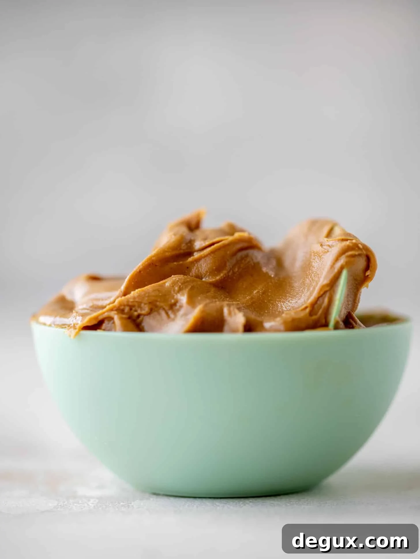 Salted Peanut Butter Rice Krispie Treats Recipe — Crunchy No-Bake Bars 3 peanut butter in a measuring cup