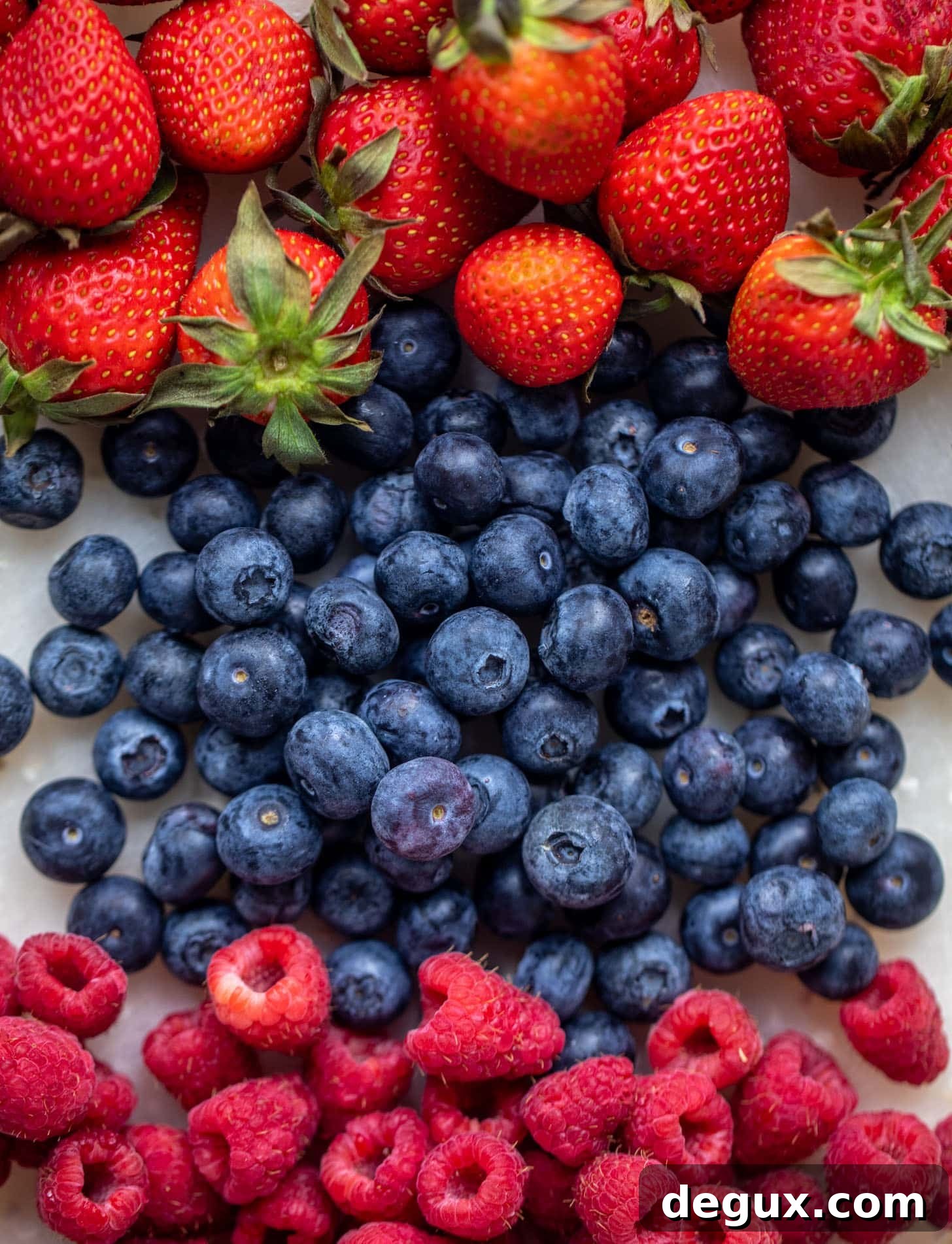 Triple Berry Vanilla Sheet Cake with Cream Cheese Frosting 3 strawberries, blueberries and raspberries