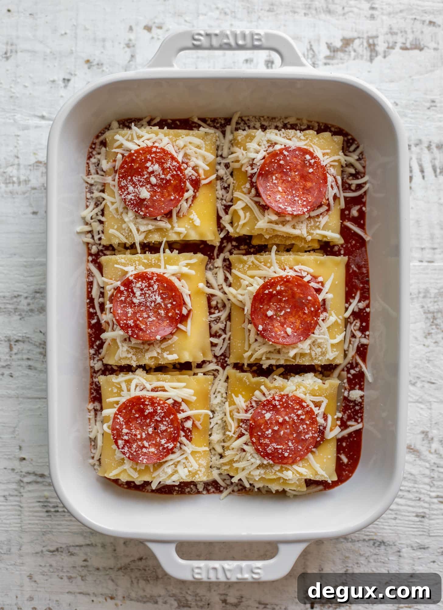 pepperoni pizza lasagna roll ups ready for the oven